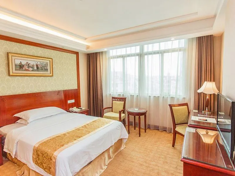 Bed in Vienna Hotel Dongguan Songshan Lake