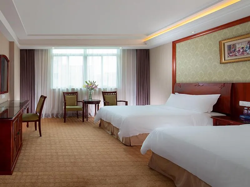 Bed in Vienna Hotel Dongguan Songshan Lake