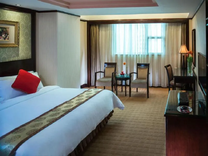 Bed in Vienna Hotel Shenzhen Fuhua Road