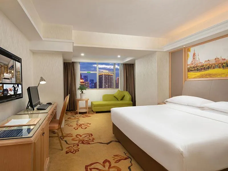 Bed in Vienna International Hotel Changsha Furong Plaza