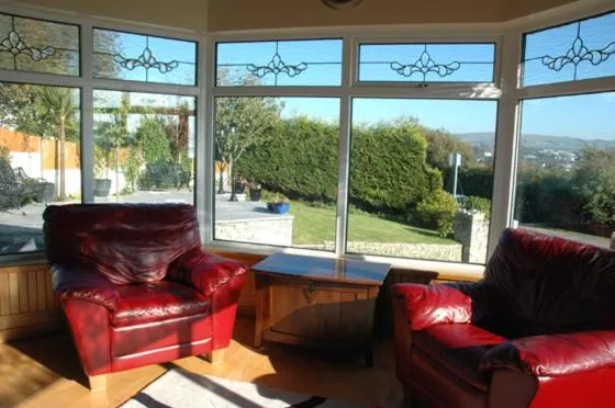 Communal lounge/ TV room in Caldra B&B