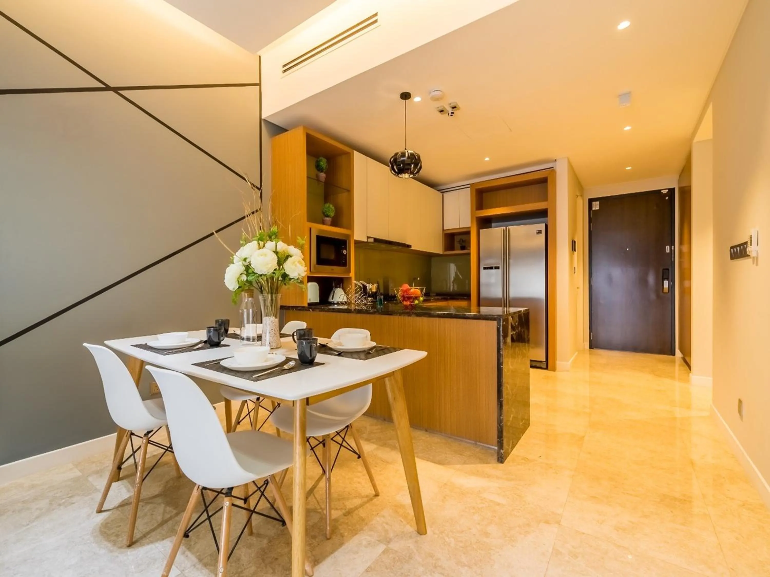 Kitchen or kitchenette in Leo Guesthouse at Anggun Residence Suite