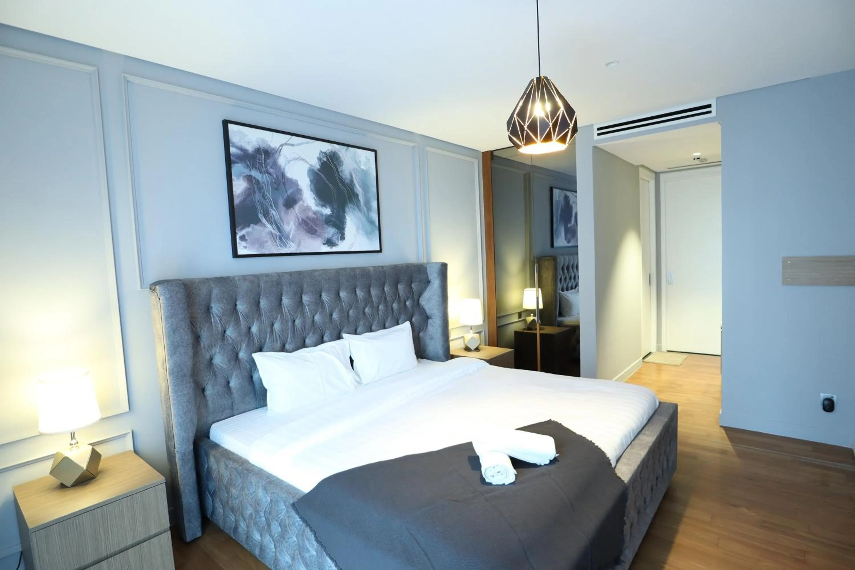 Bed in Leo Guesthouse at Anggun Residence Suite