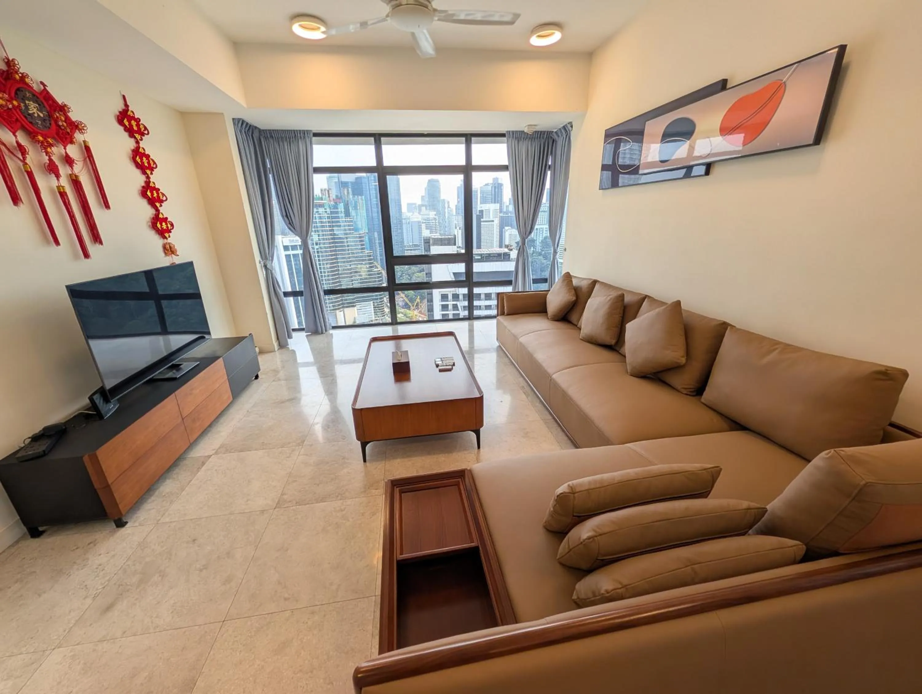 TV and multimedia in Leo Guesthouse at Anggun Residence Suite