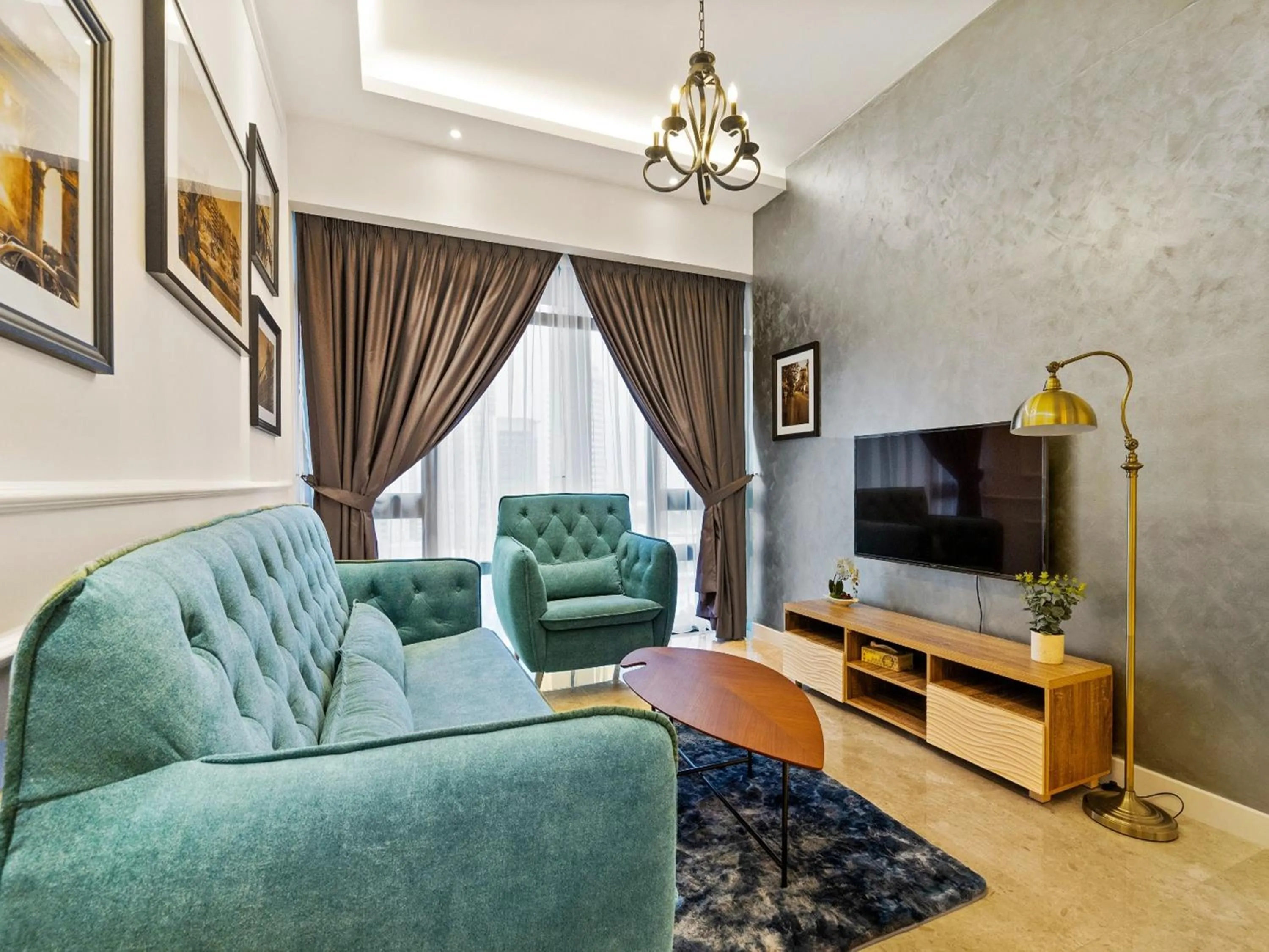 TV and multimedia in Leo Guesthouse at Anggun Residence Suite