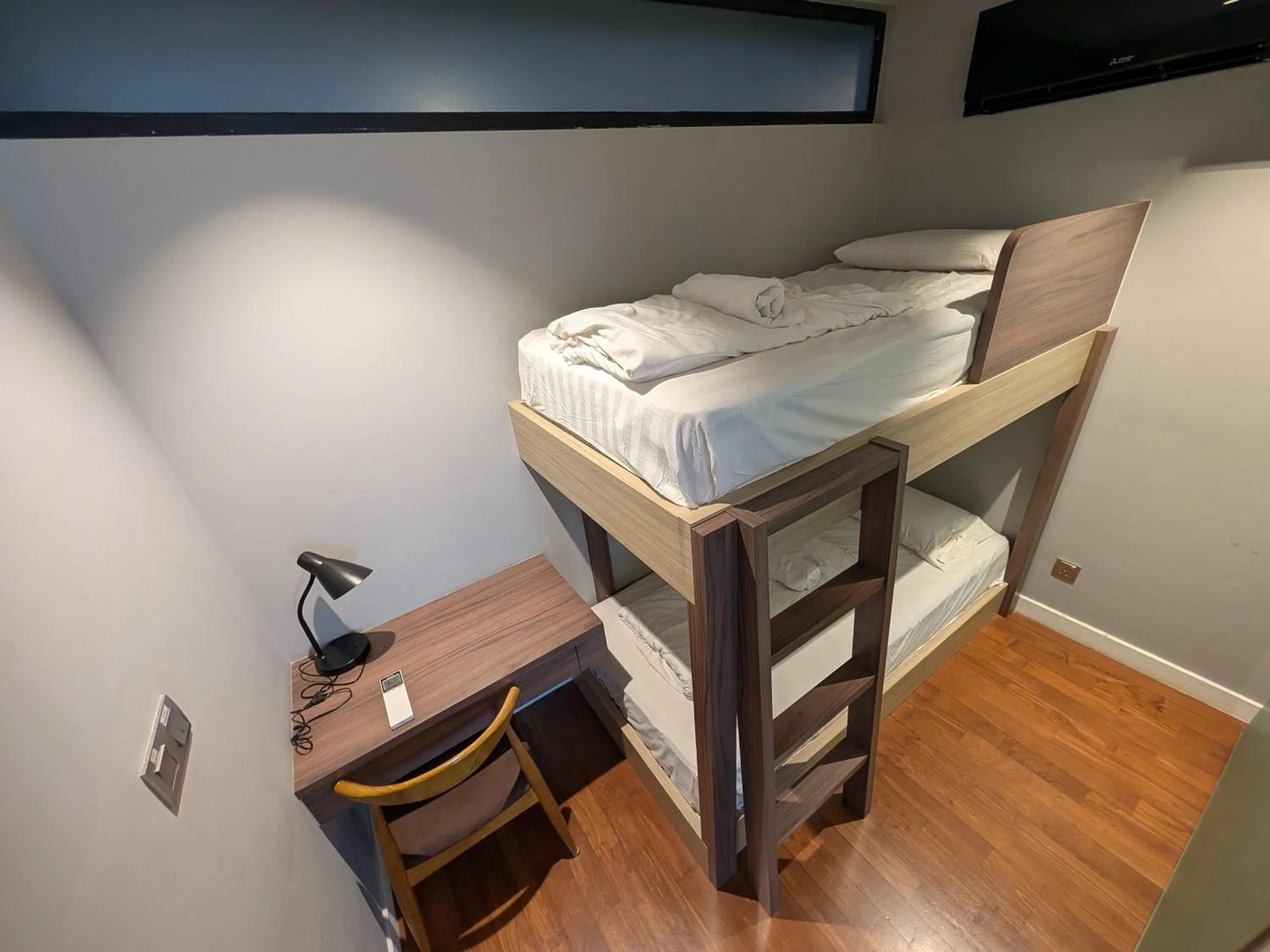 Bed in Leo Guesthouse at Anggun Residence Suite