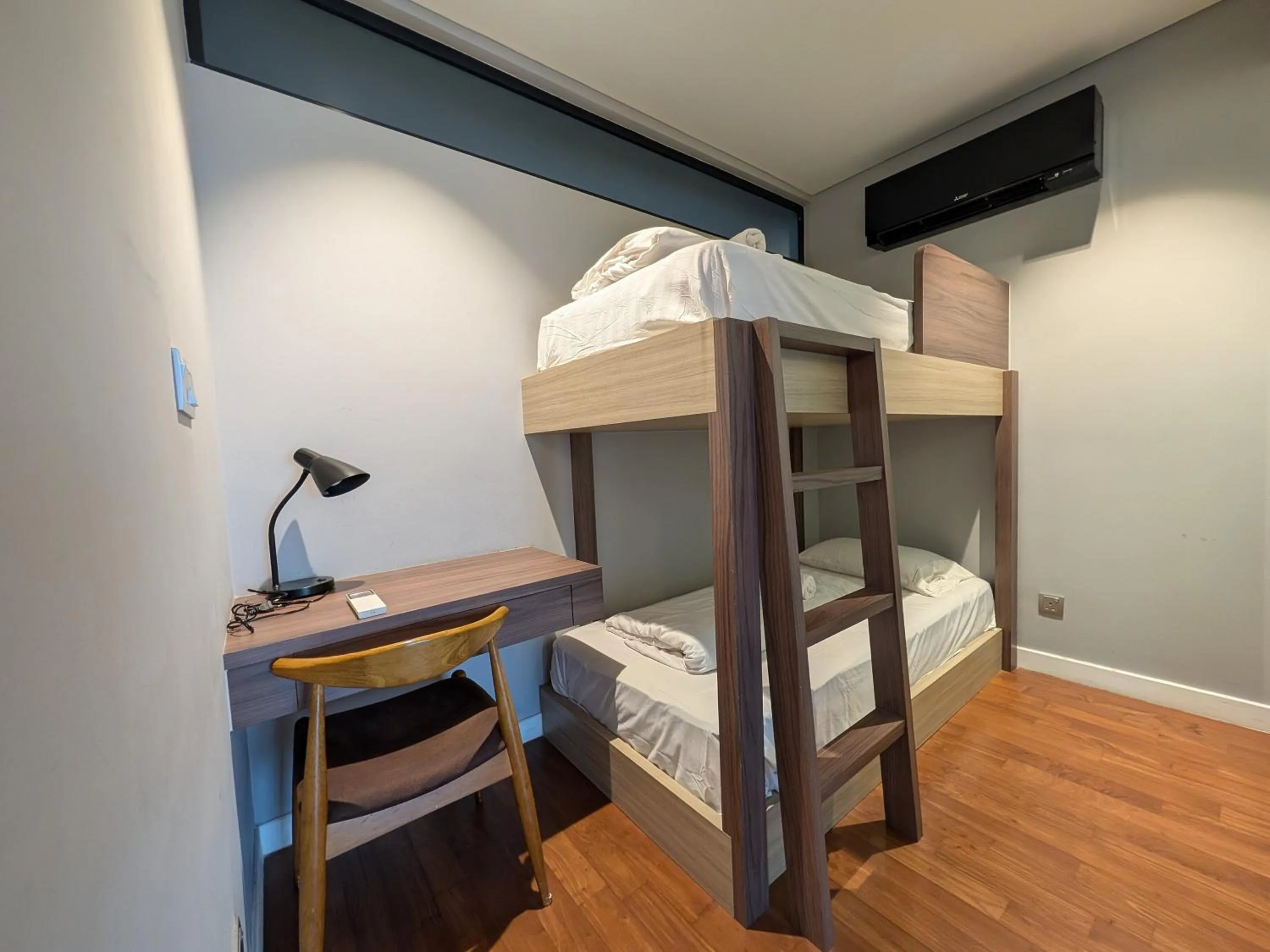 Bed in Leo Guesthouse at Anggun Residence Suite