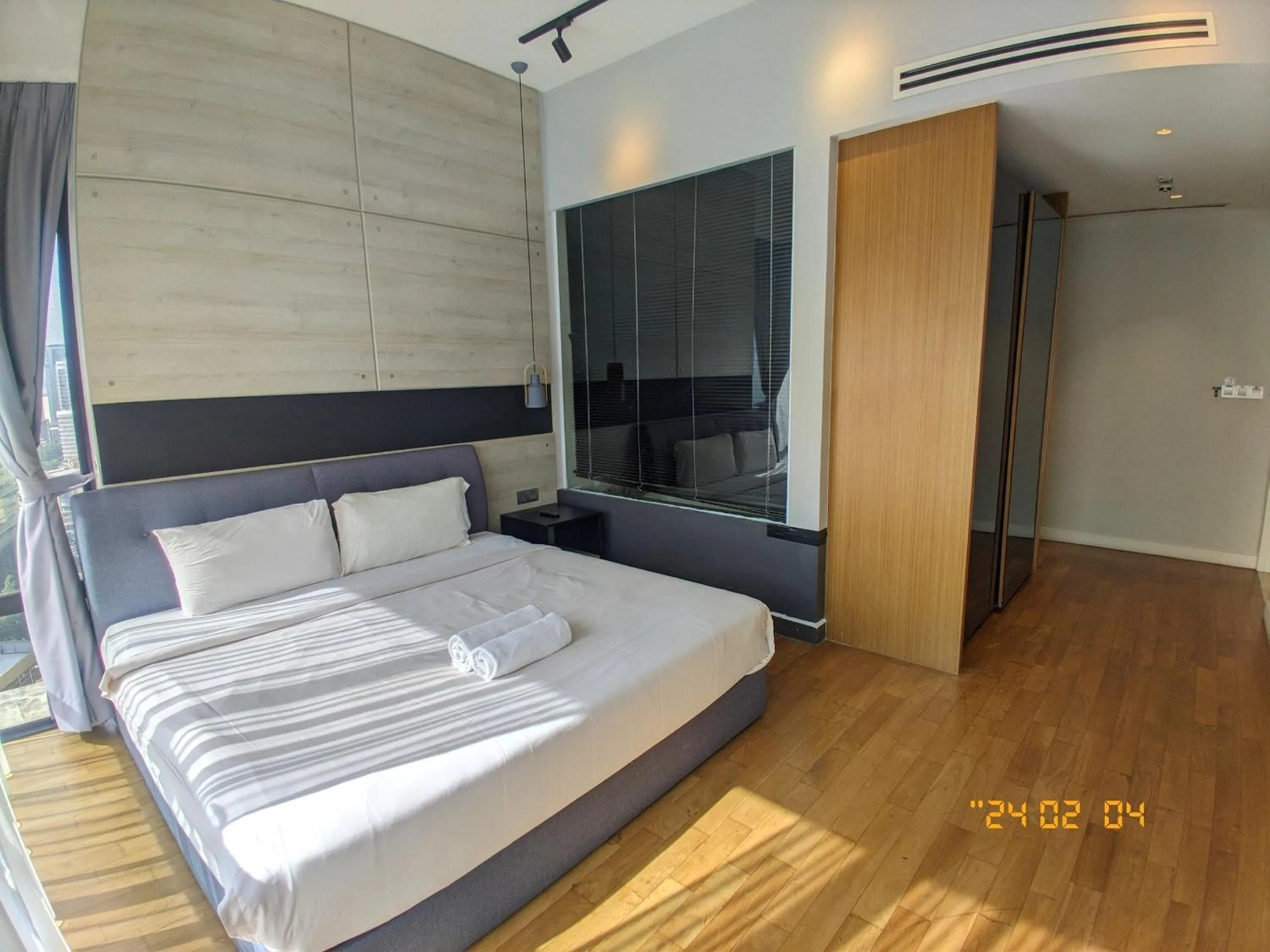 Bed in Leo Guesthouse at Anggun Residence Suite