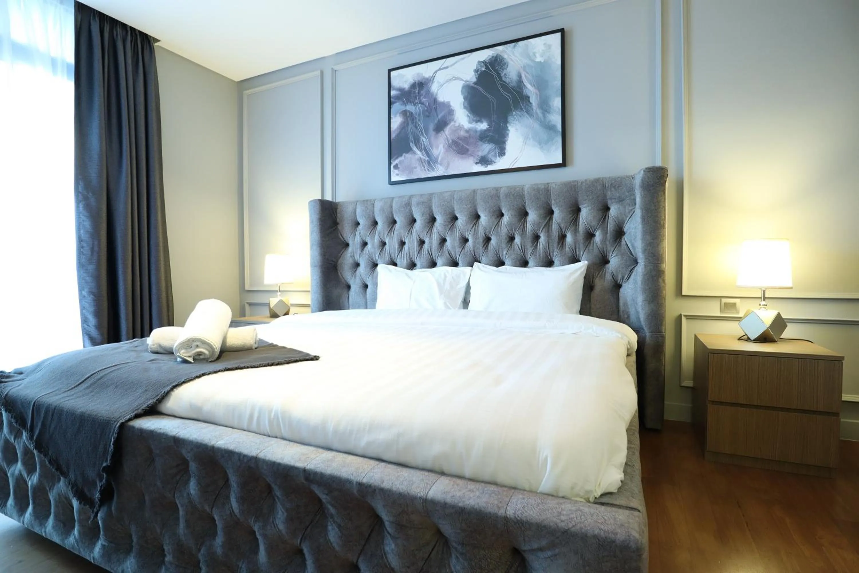 Bed in Leo Guesthouse at Anggun Residence Suite