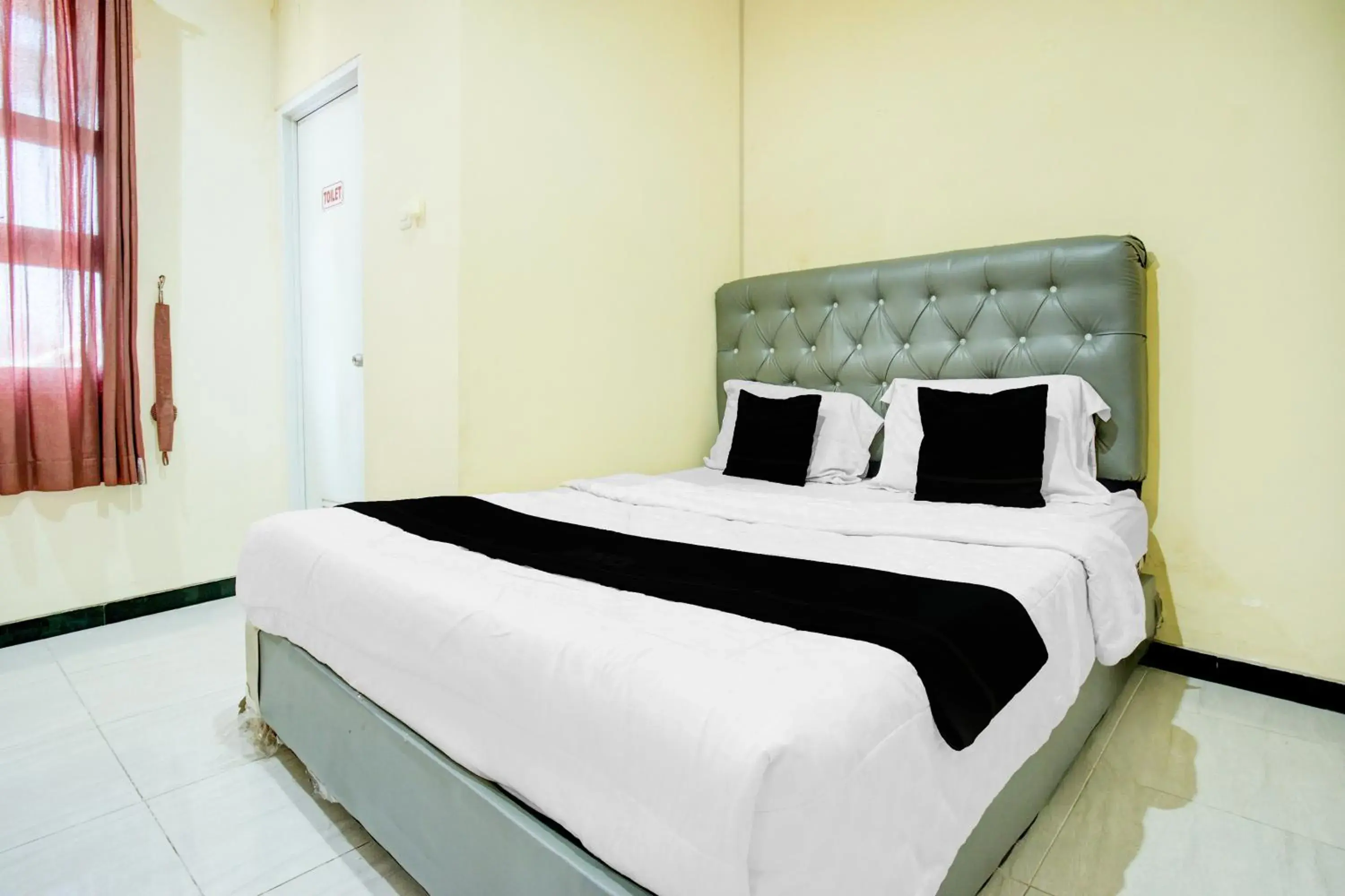 Deluxe Double Room in Hotel O Palembang near Palembang City Center Mall formerly Kostel 97 Deluxe Double Room in Hotel O Palembang near Palembang City Center Mall formerly Kostel 97