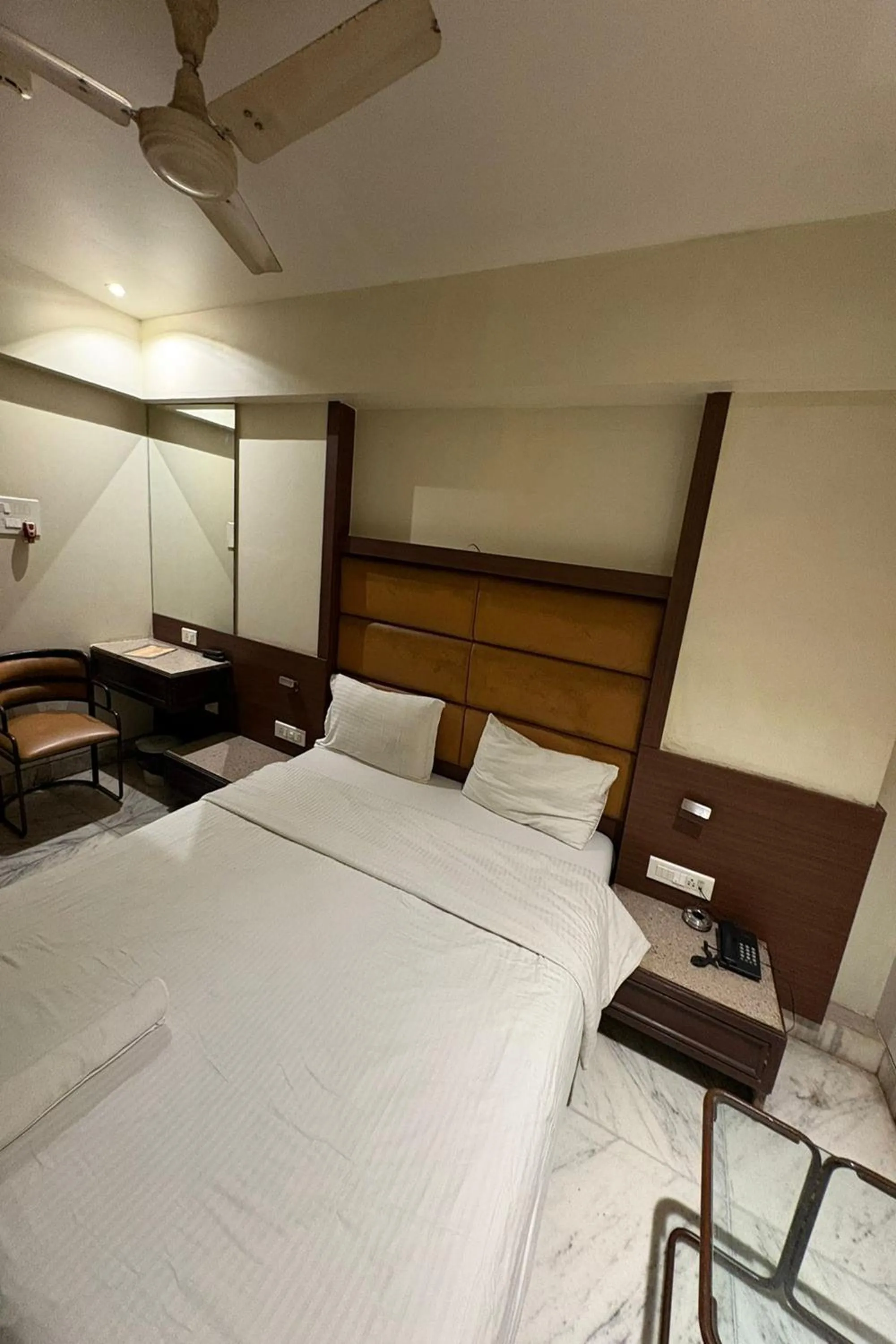 Bed in Pravasi Residency