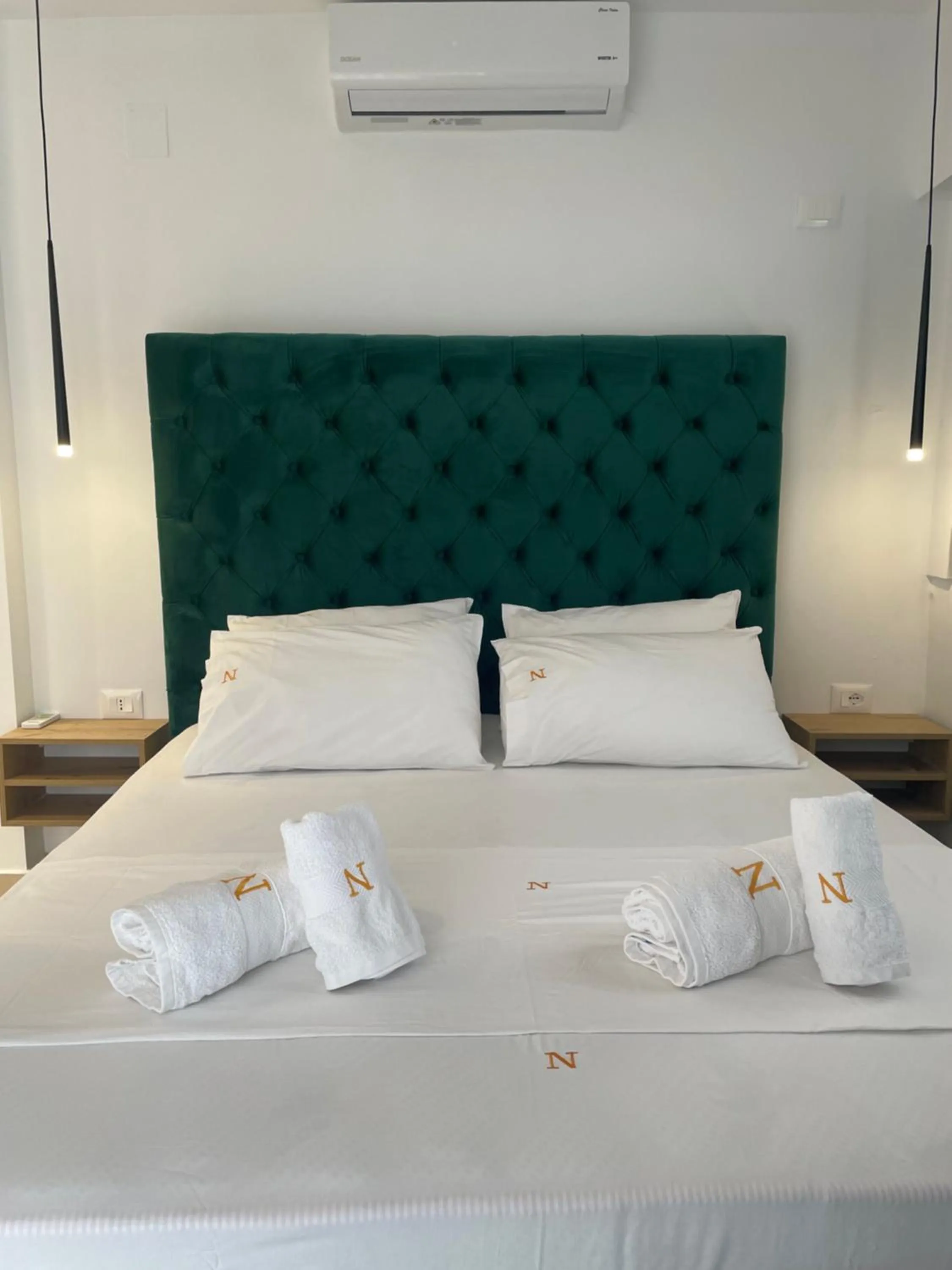 Photo of the whole room, Bed in Qeparo Napolon Complex