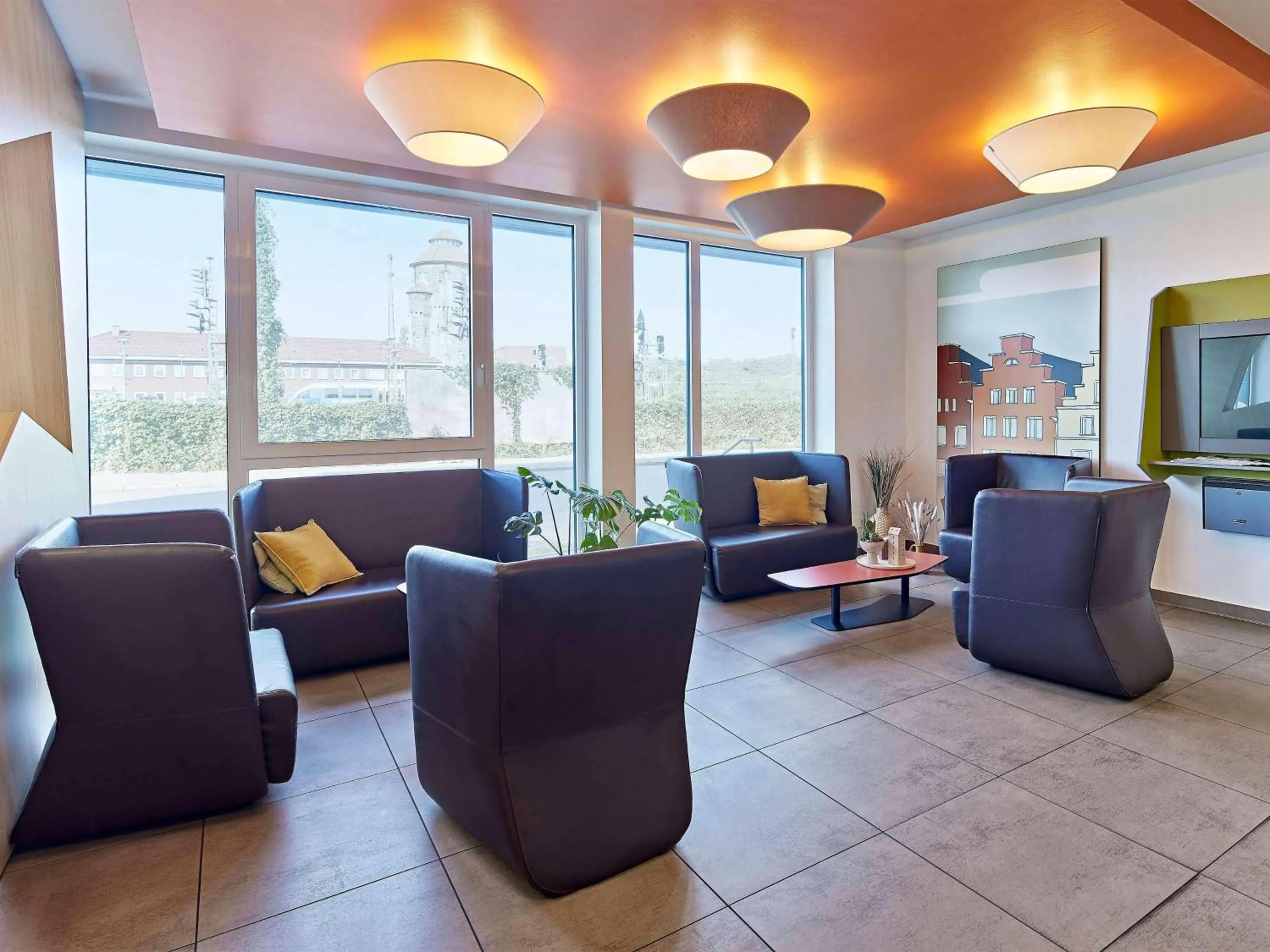 Lobby or reception in B&B Hotel Osnabrück