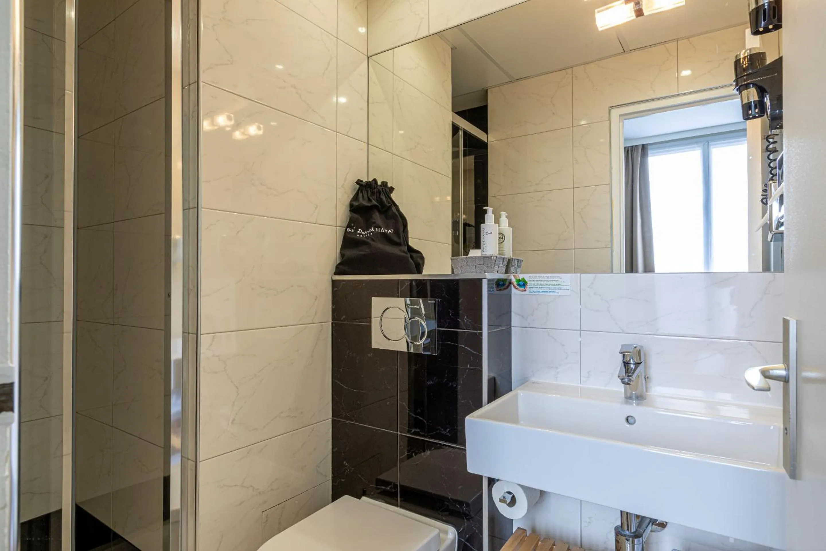 Shower in Hotel Olympic Paris Boulogne by Patrick Hayat