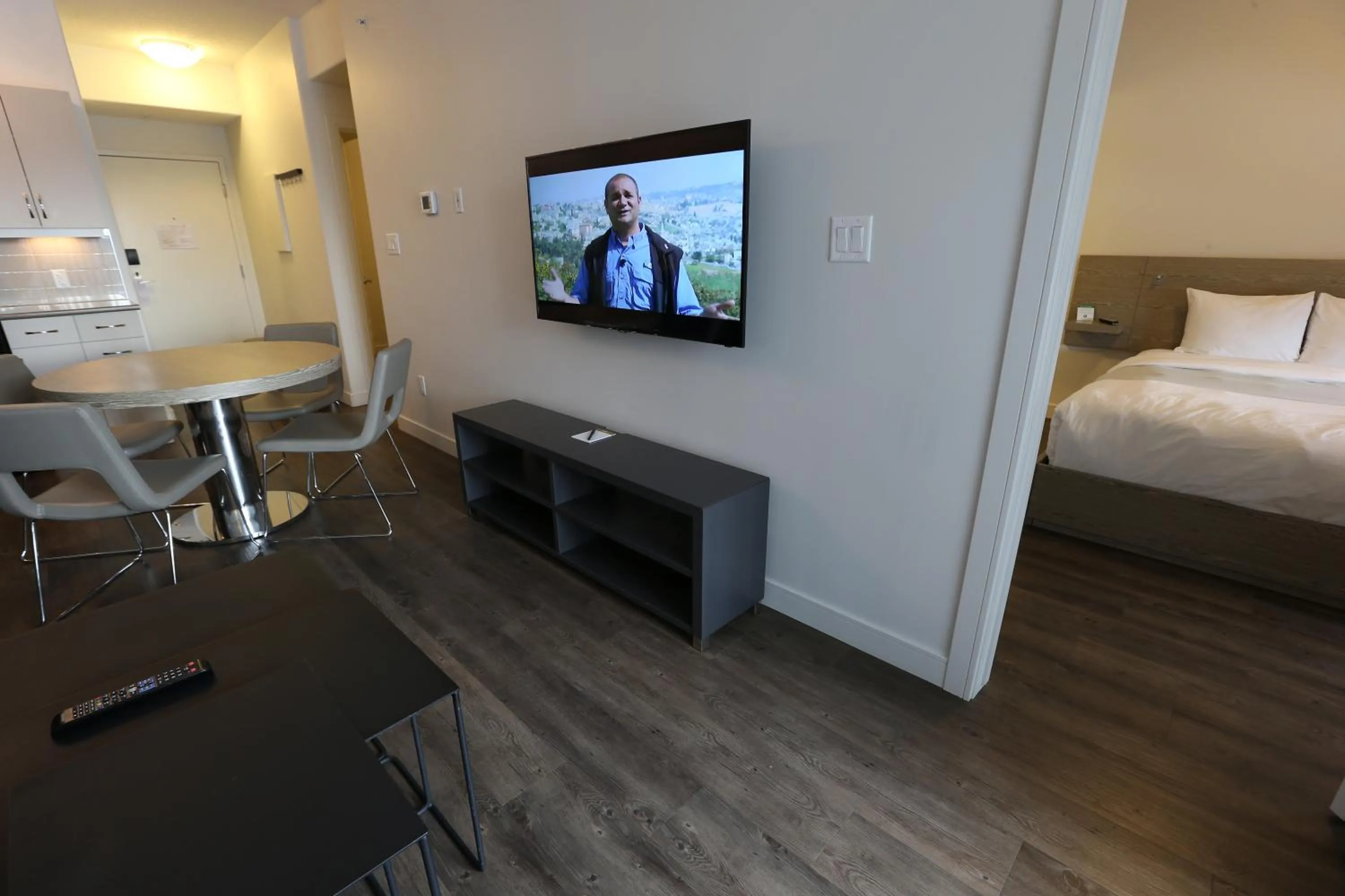 Bed, TV/Entertainment Center in Ramada by Wyndham Fort McMurray