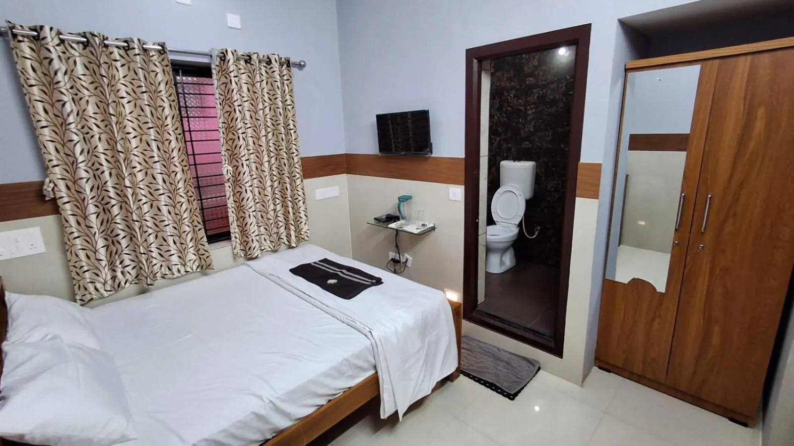 Bed in Janardan Residency