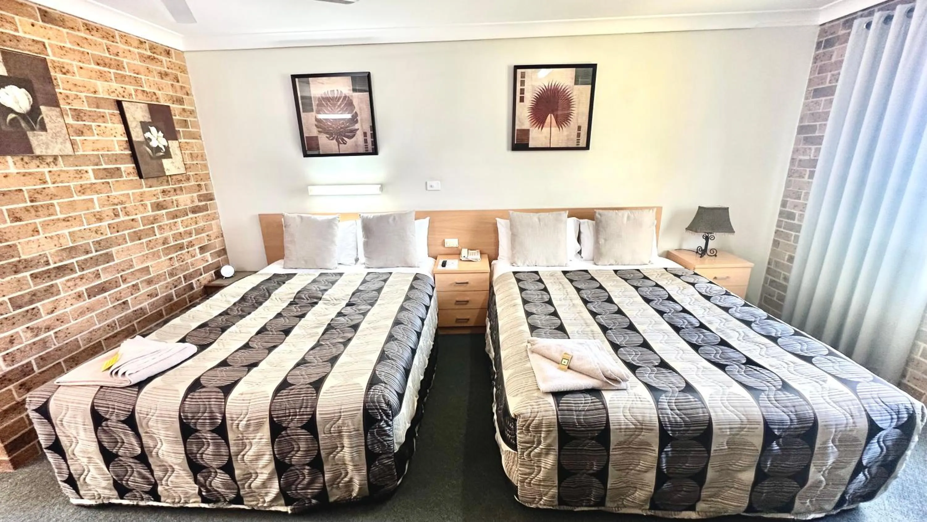 Bed in Golden Grain Motor Inn