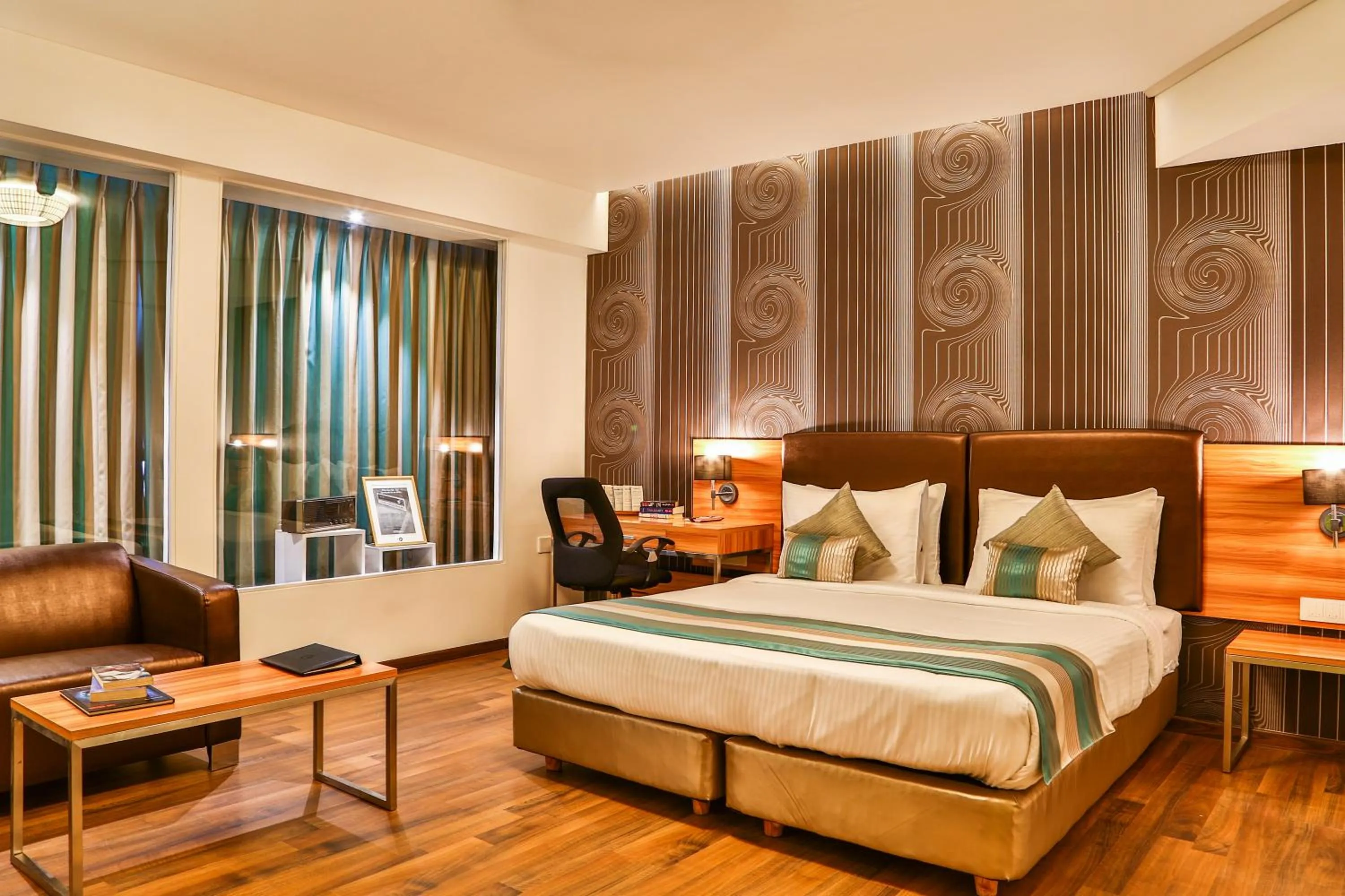 Photo of the whole room, Bed in T24 Residency Mumbai International Airport Hotel