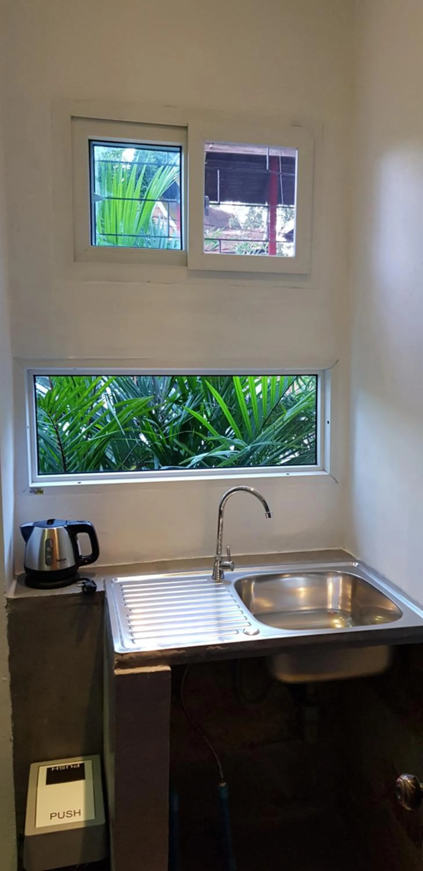 Kitchen or kitchenette in Samui Beach Residence Hotel