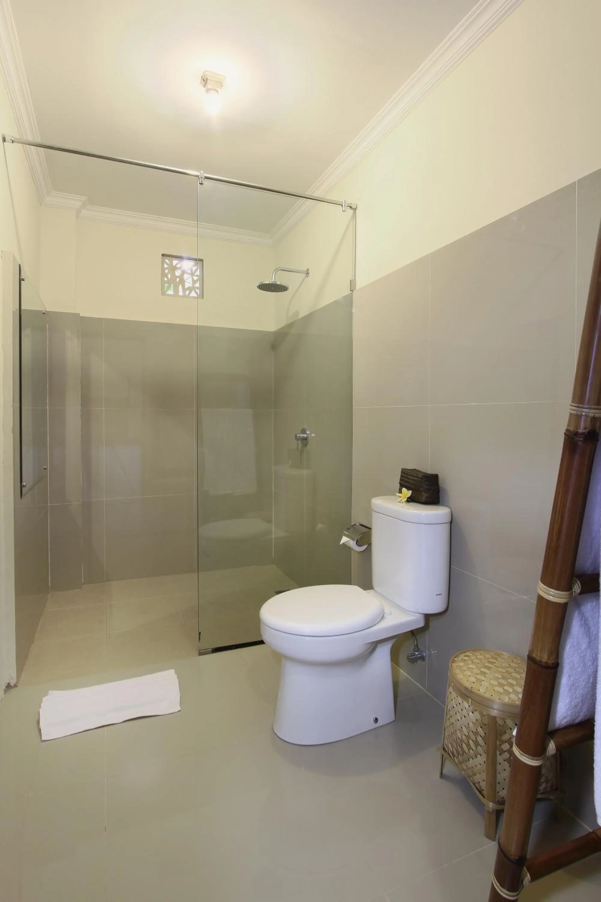 Toilet in Nang Ade Villa by GenuineHost