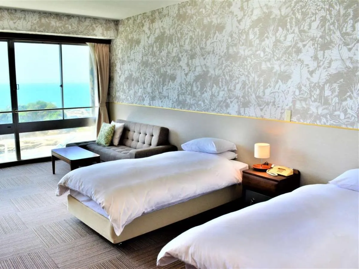 Bed in Shiosai Resort Kamogawa