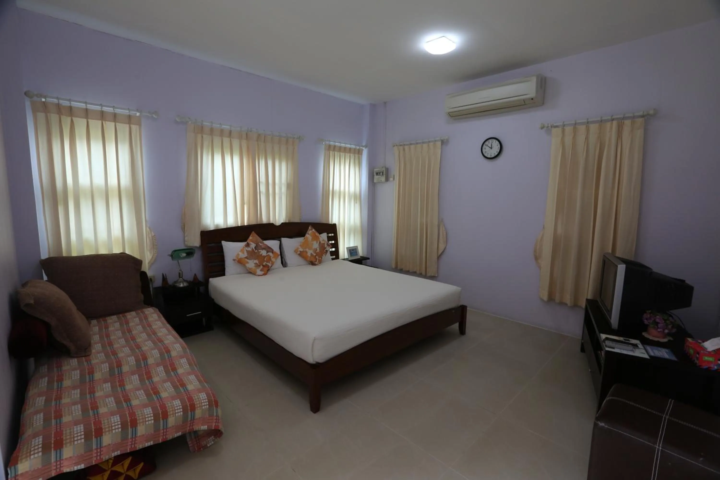 Bed in Bansuanrachawadee B&b