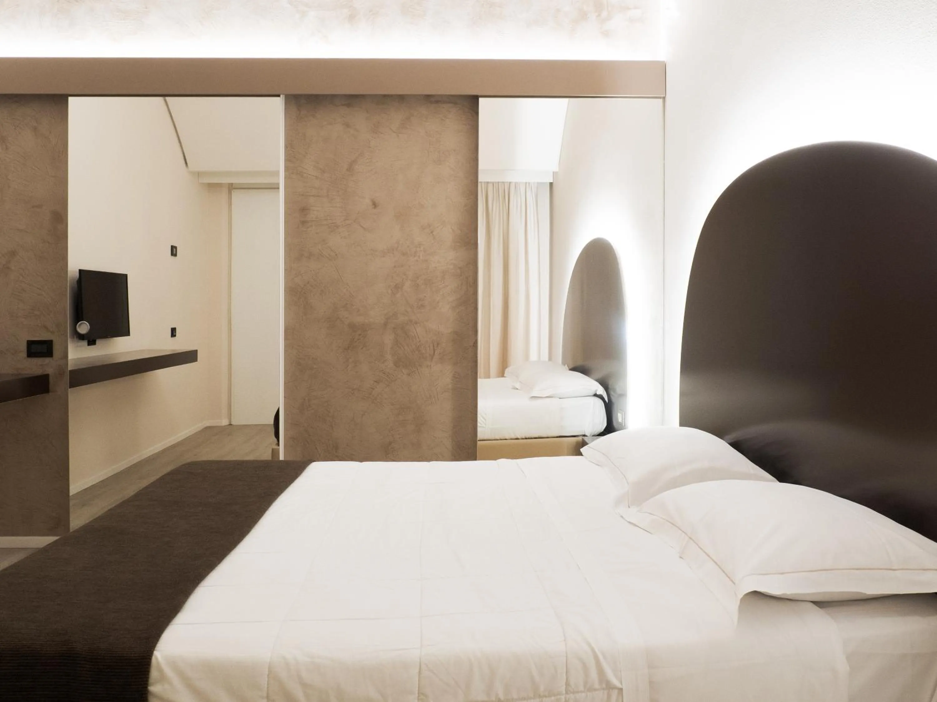 Bed in Dealuna Motel