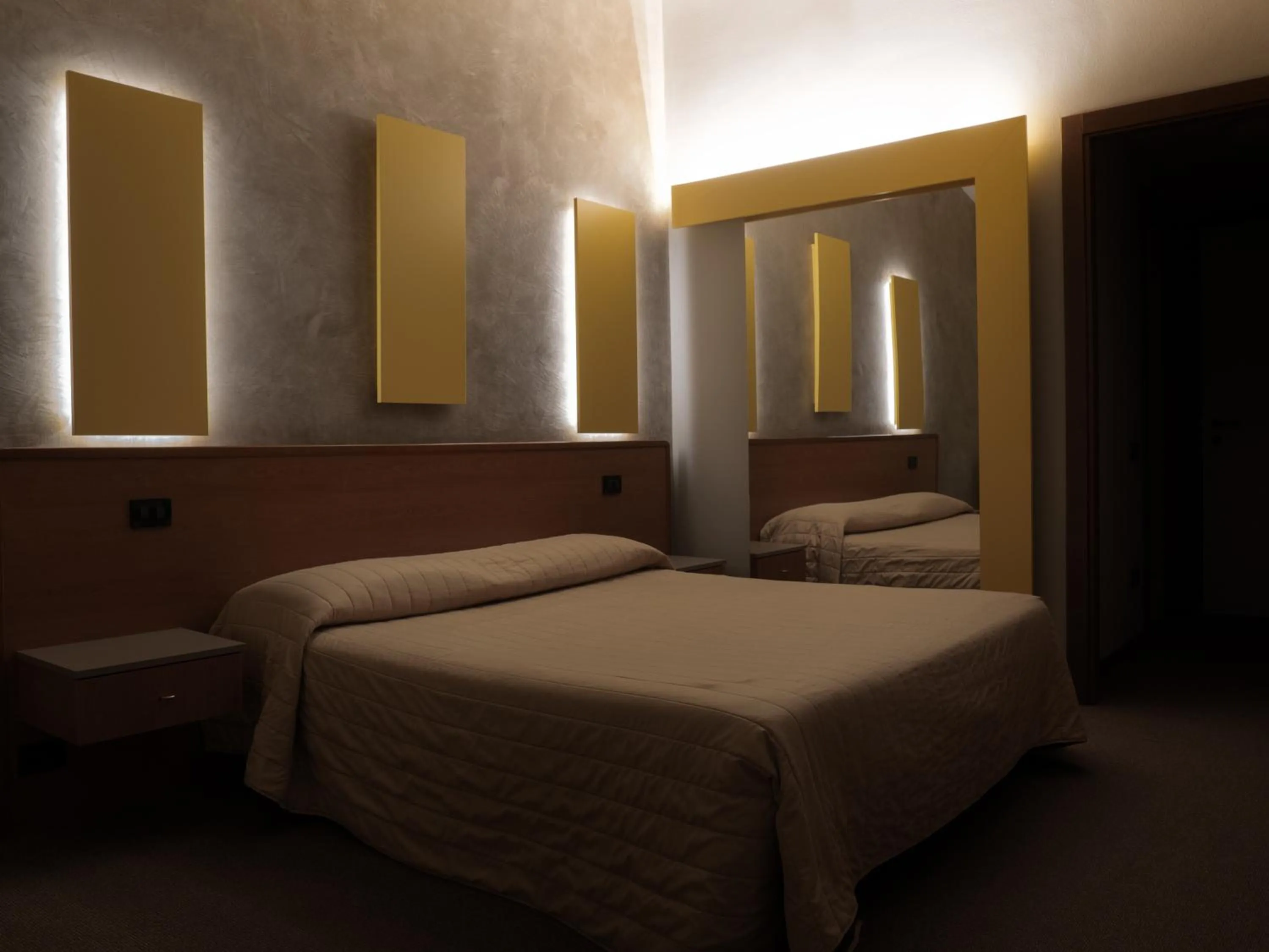 Bed in Dealuna Motel