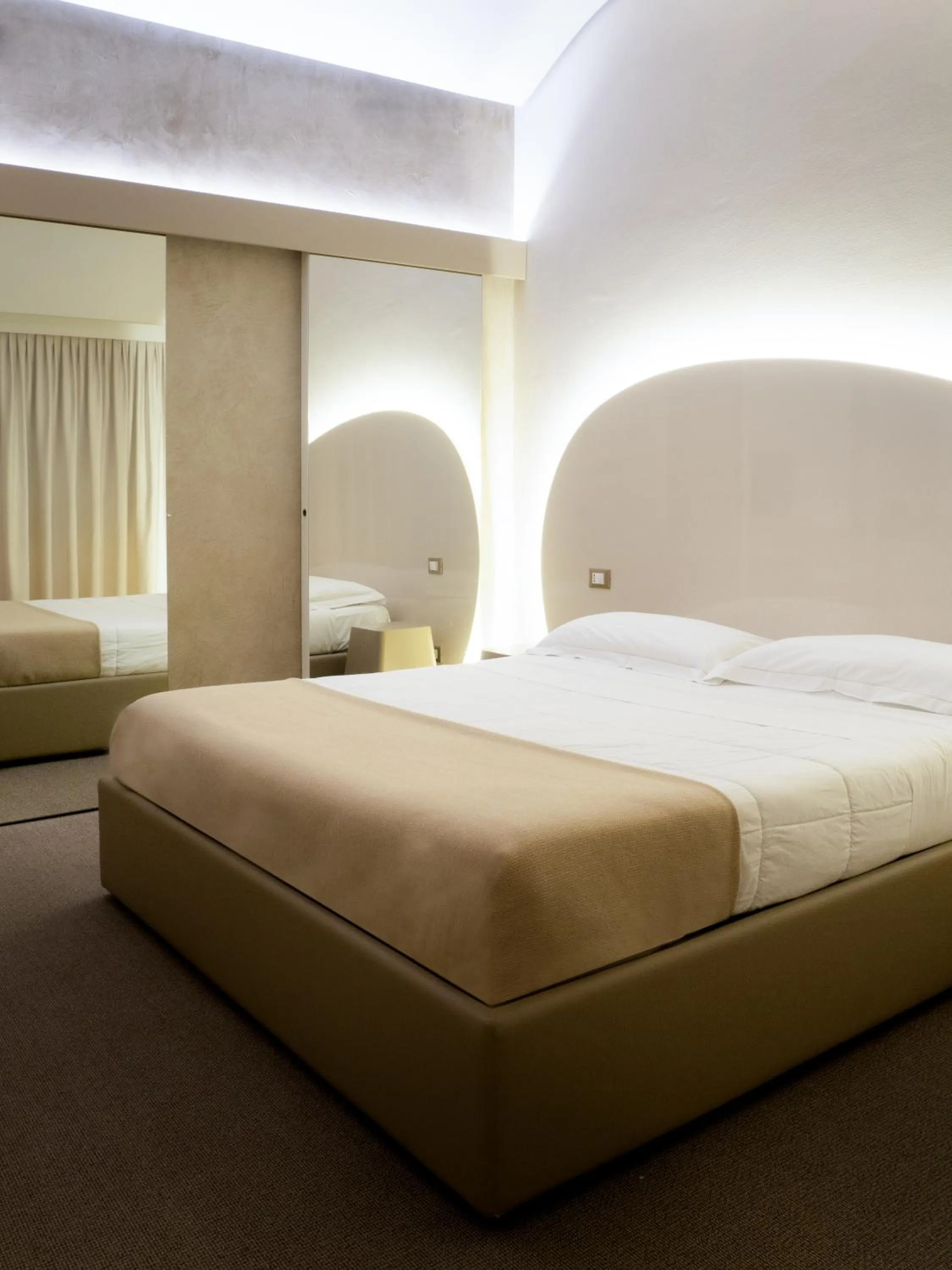 Bed in Dealuna Motel