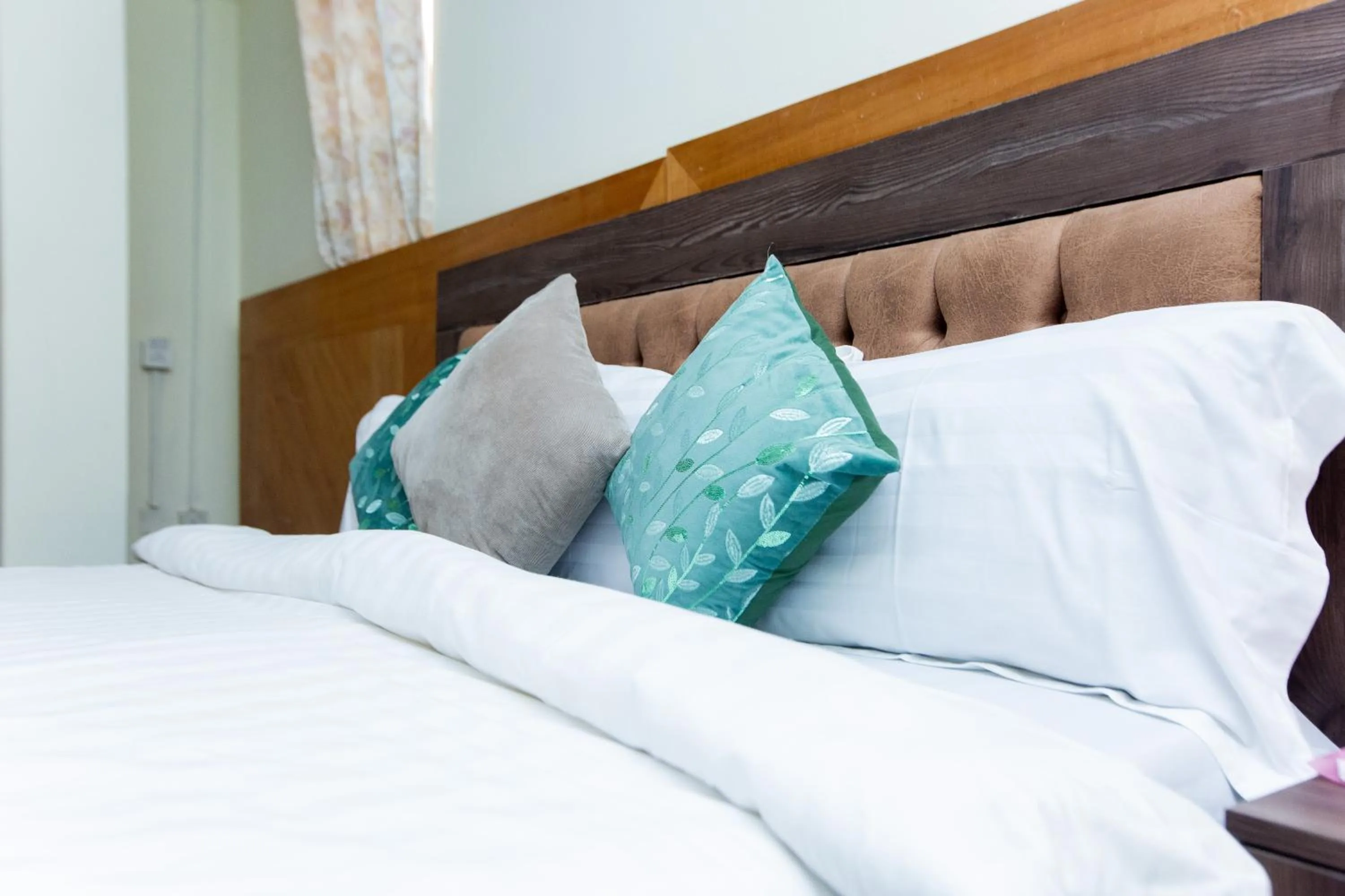 Bedroom in Sam's Cottage Hotel