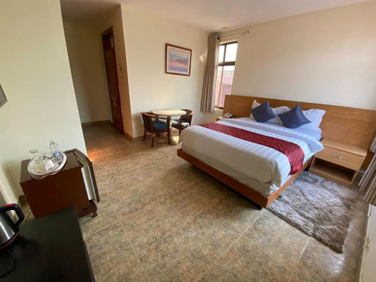 Bed in Sam's Cottage Hotel