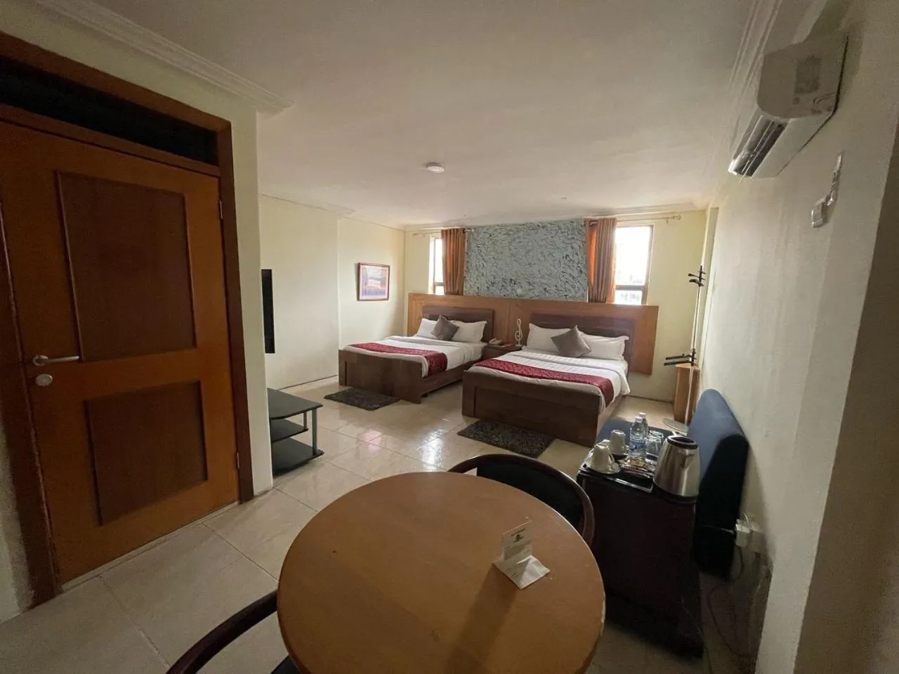 Bedroom in Sam's Cottage Hotel