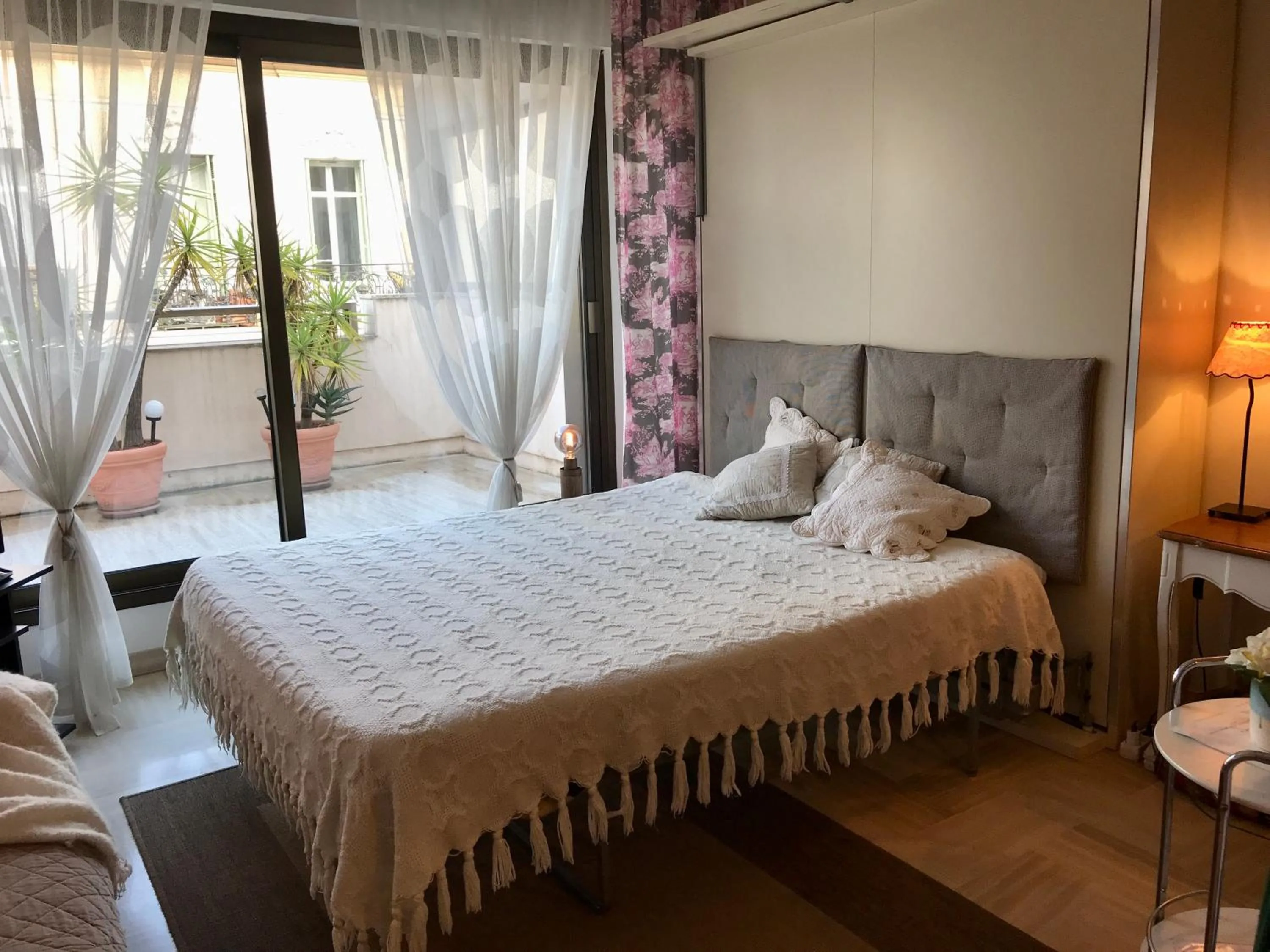 Bed in Gray d' Albion Apartment