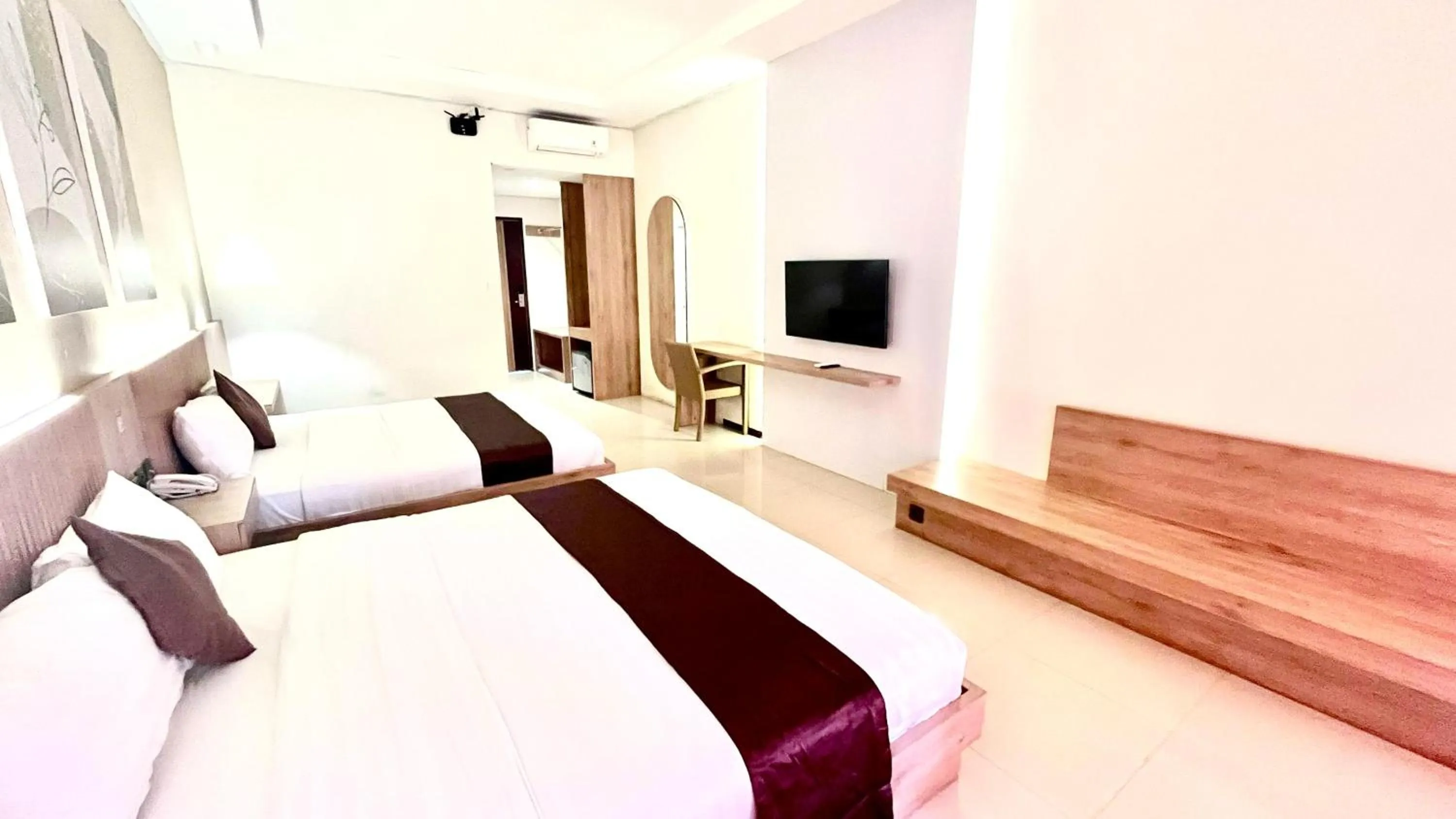 Bed in Surya Kencana Seaside Hotel