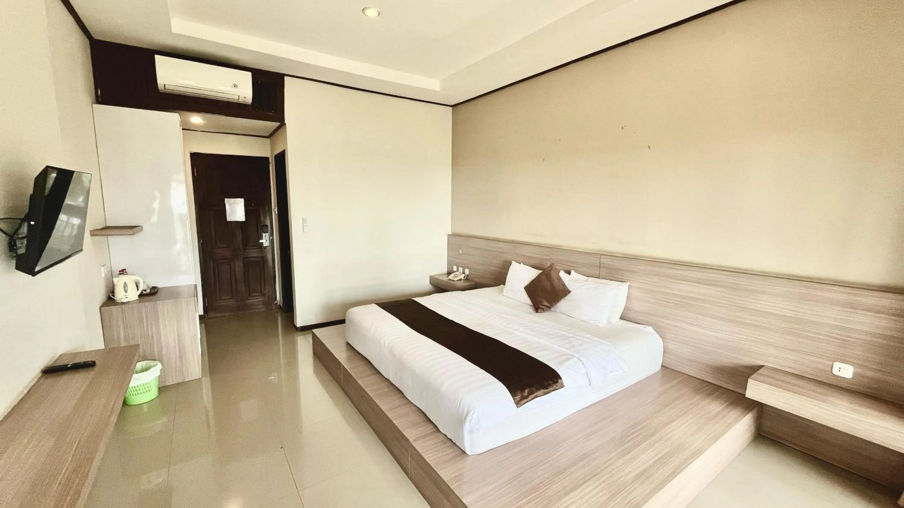 Bed in Surya Kencana Seaside Hotel