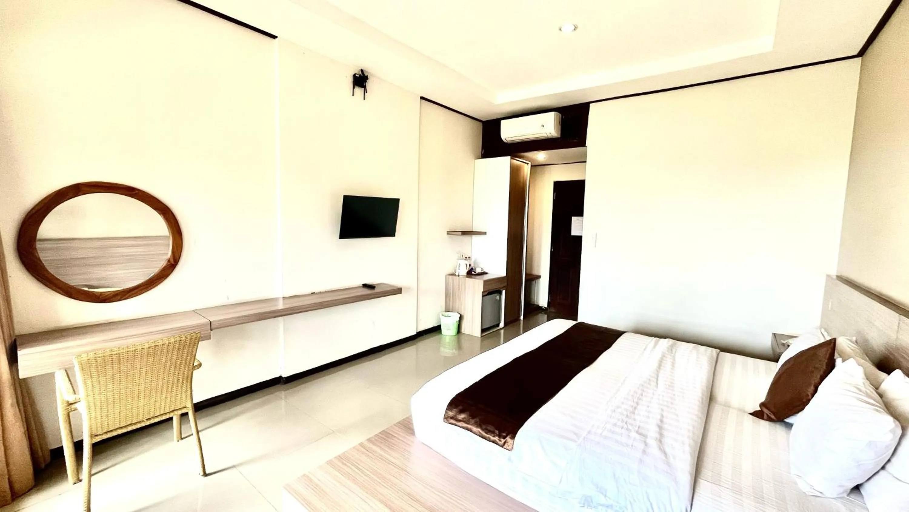 Bed in Surya Kencana Seaside Hotel