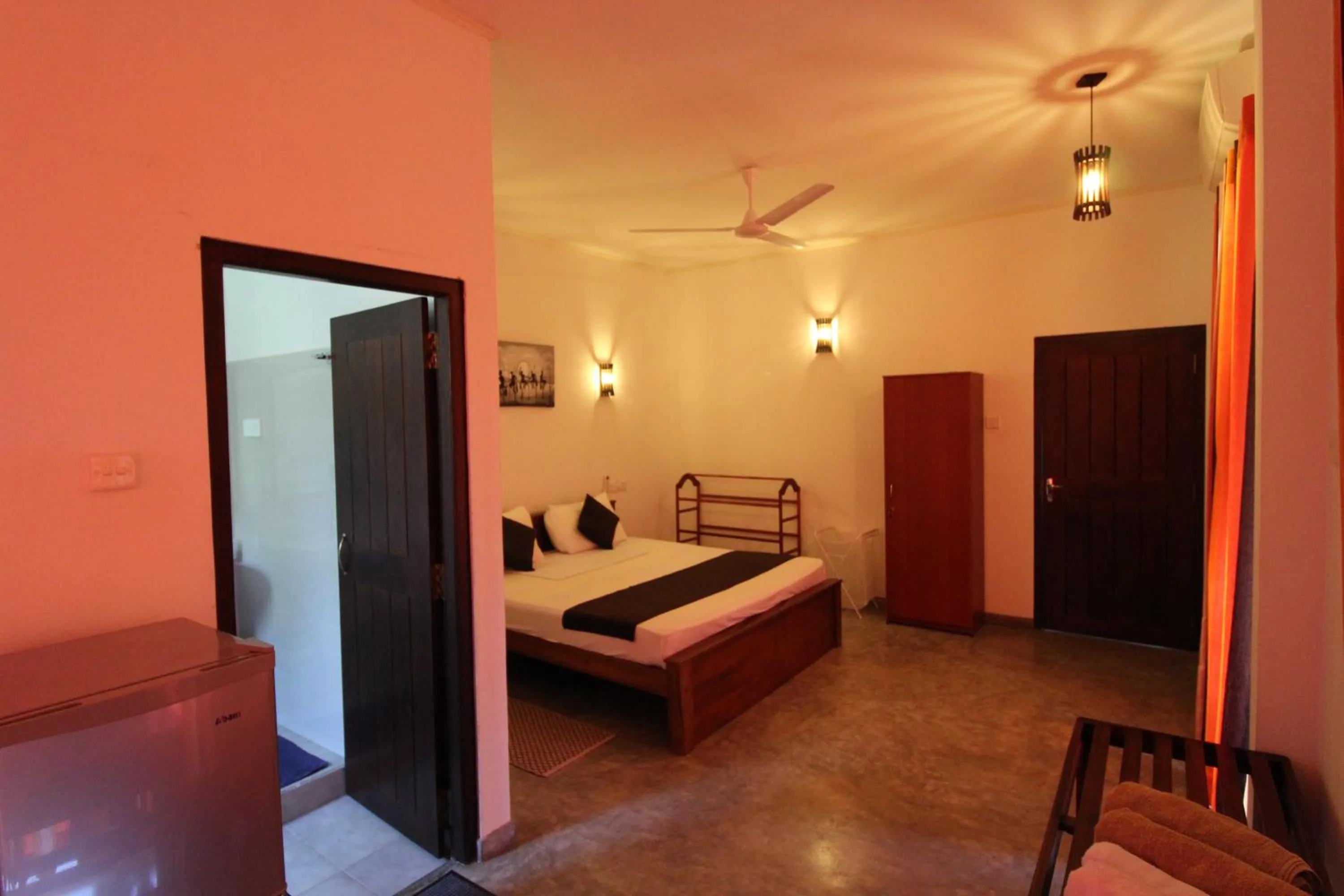 Photo of the whole room, Bed in Santori Unawatuna