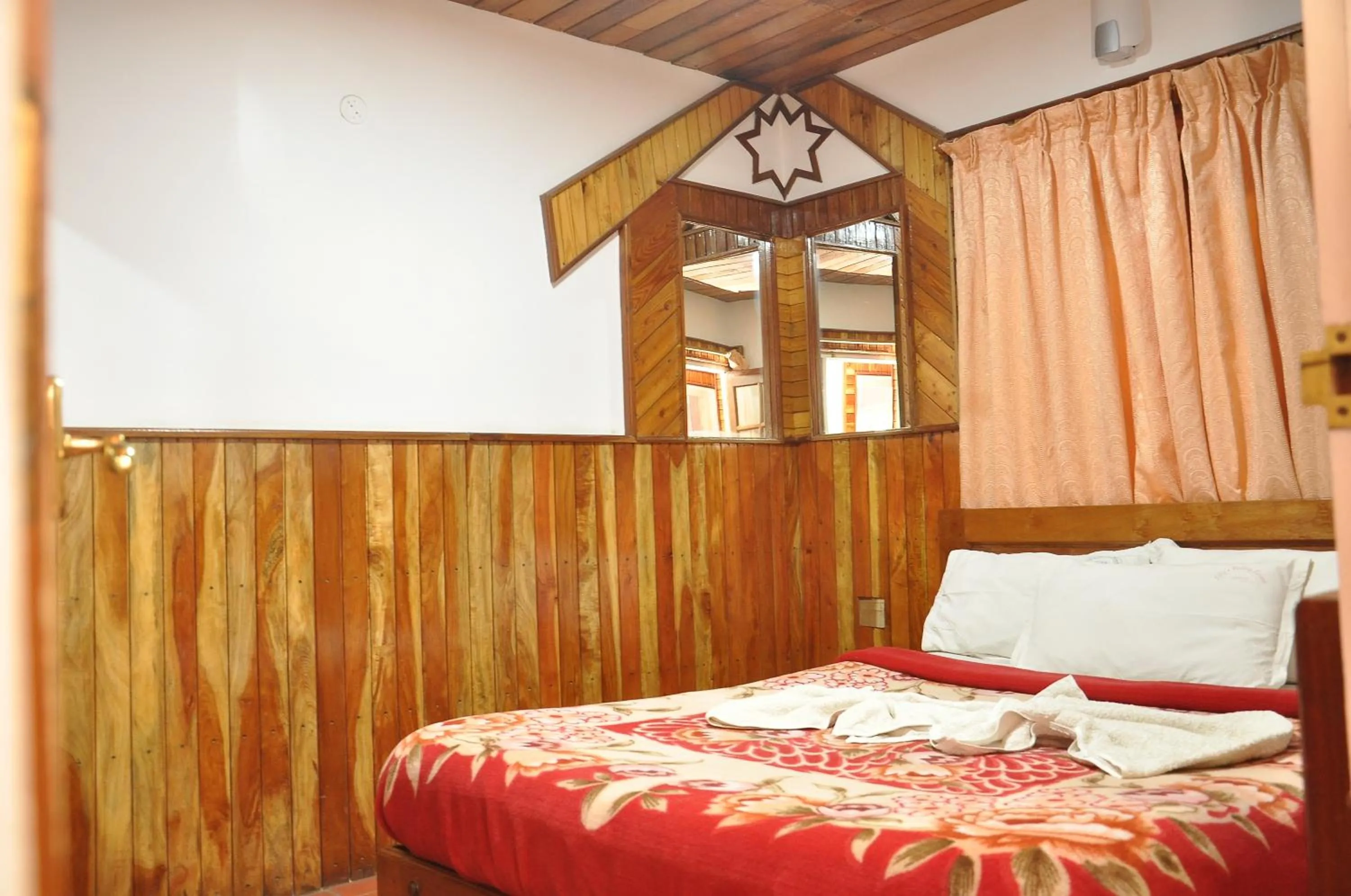 Bed in Lilly's Valley Resort