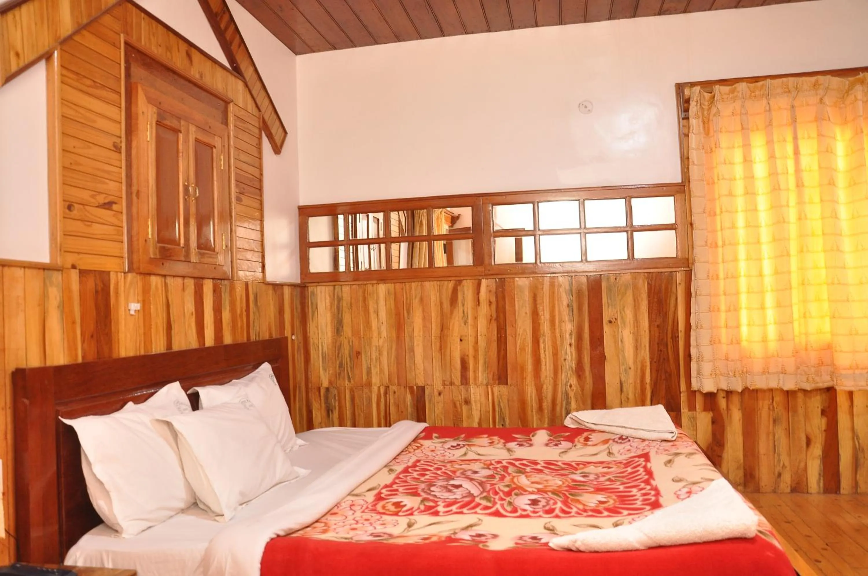 Bed in Lilly's Valley Resort