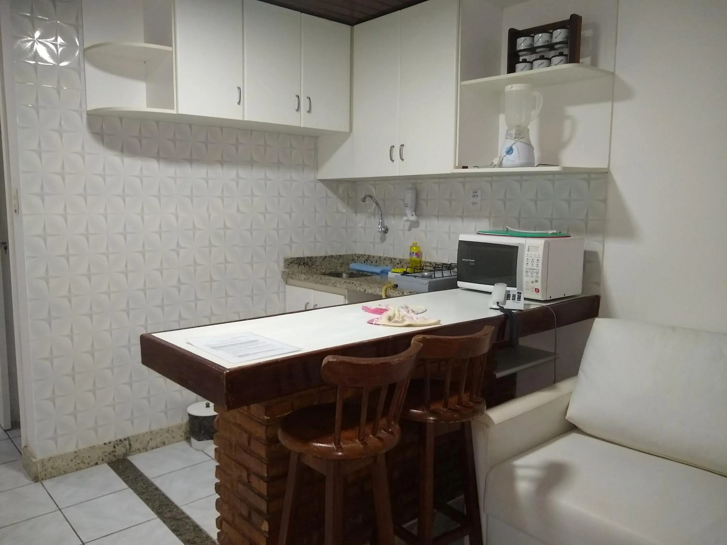 Kitchen or kitchenette in Flat na Praia do Farol da Barra