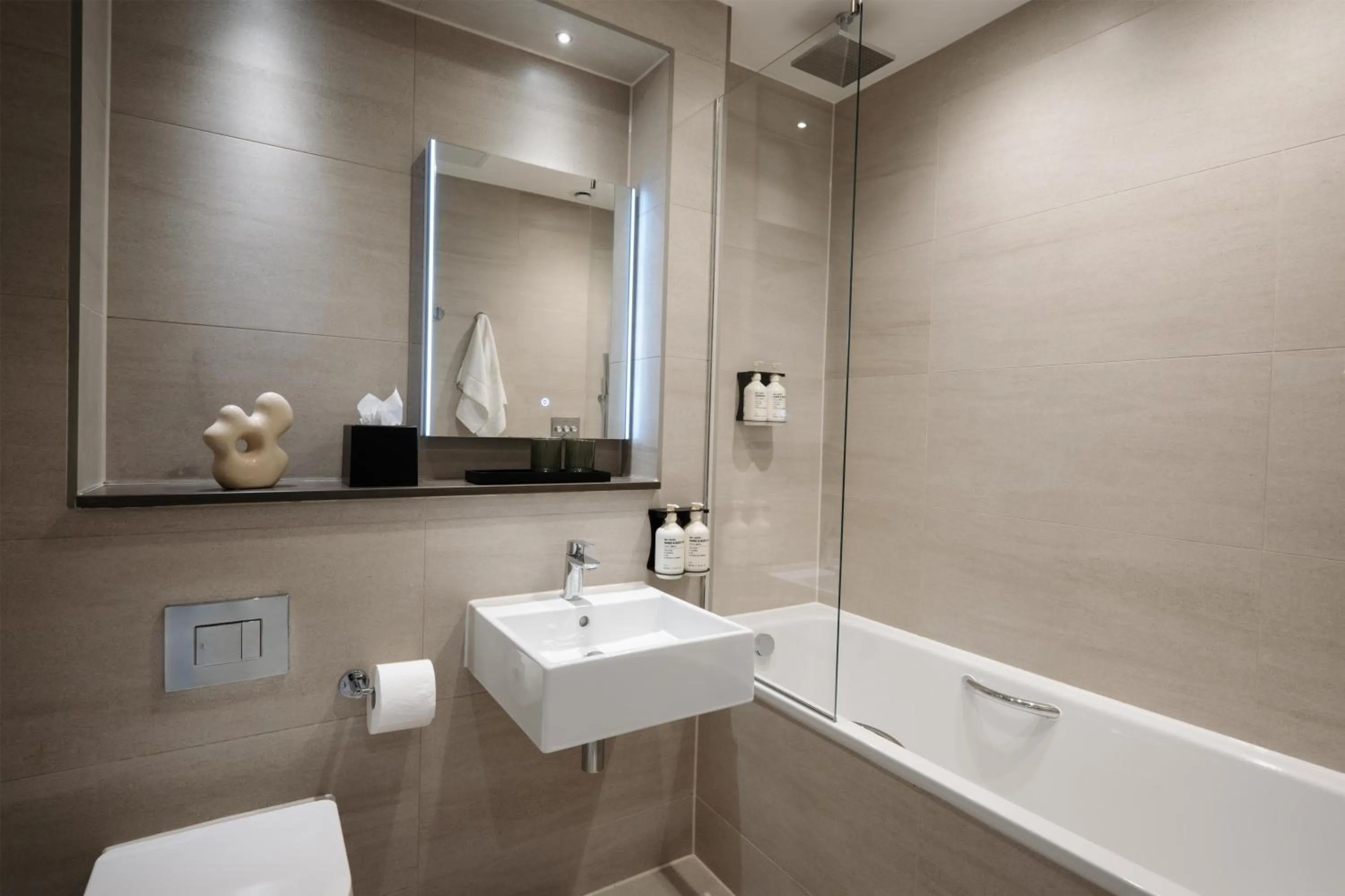 Bathroom in The Hobson Cambridge by Adina