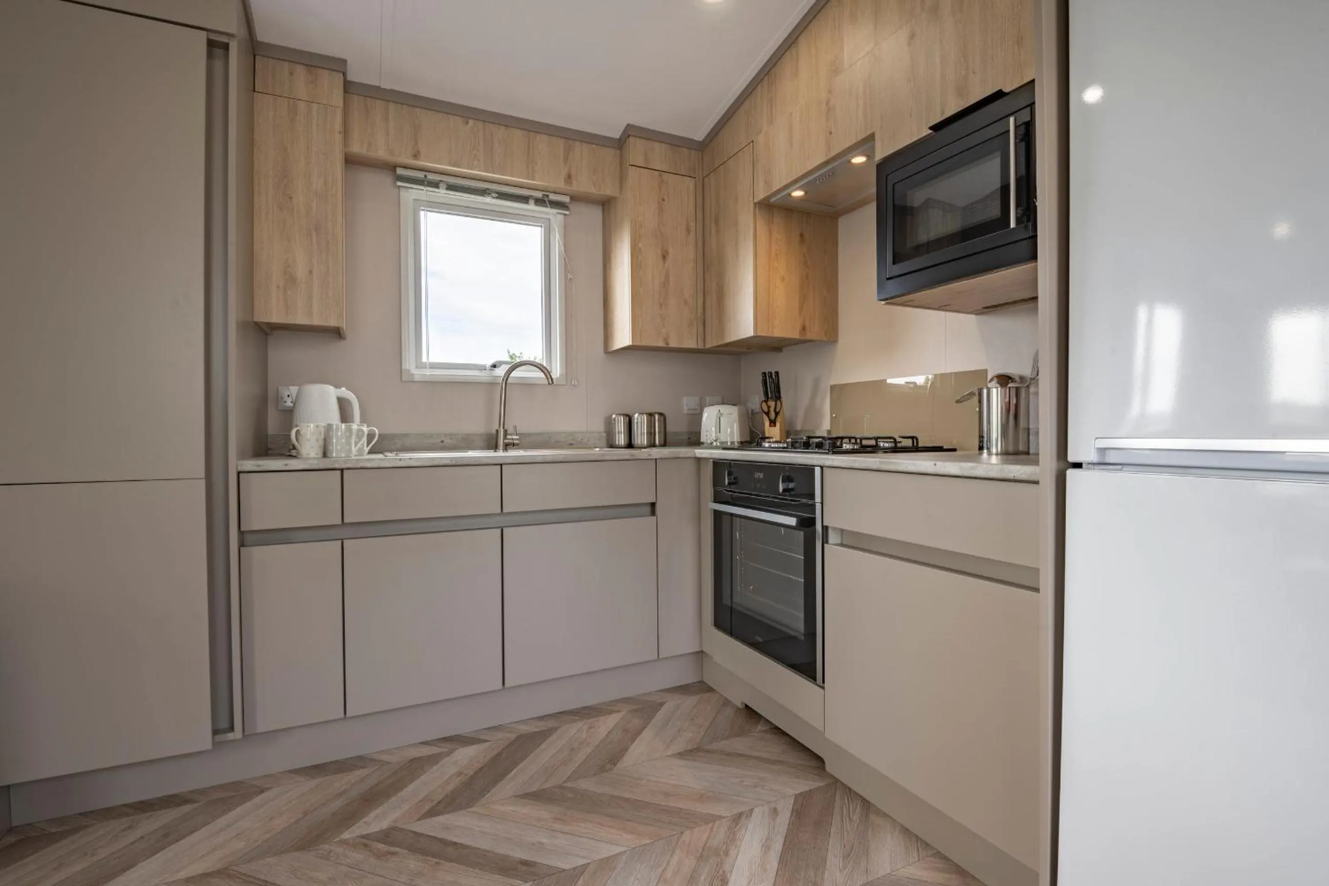 Kitchen or kitchenette in Tan Rallt Holiday Park & Spa