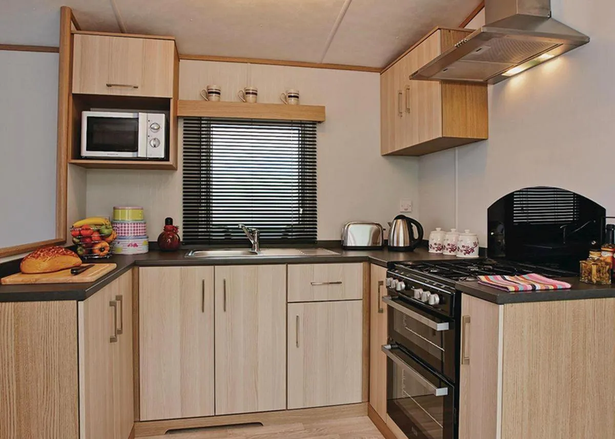 Kitchen or kitchenette in Tan Rallt Holiday Park & Spa