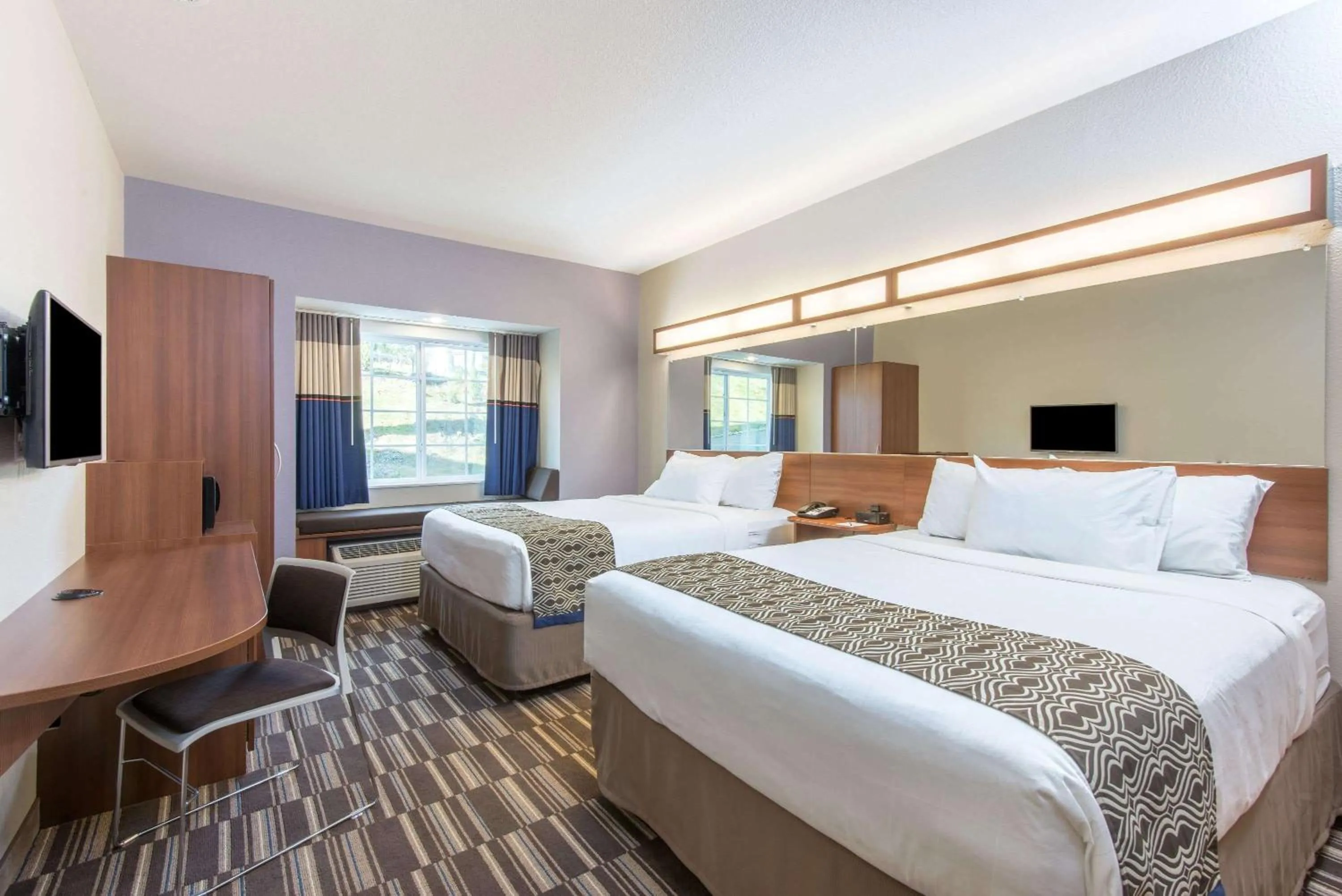 Photo of the whole room, Bed in Microtel Inn & Suites by Wyndham Cadiz