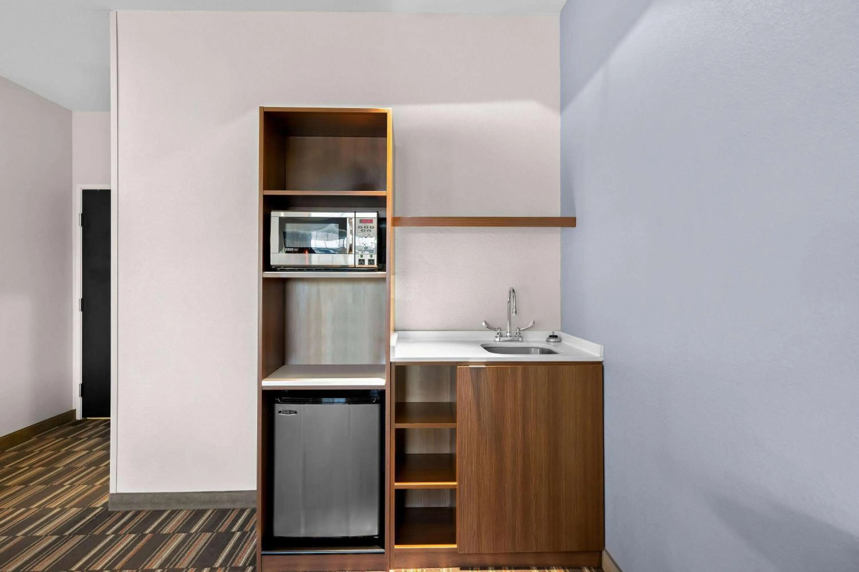 Kitchen or kitchenette in Microtel Inn & Suites by Wyndham Sweetwater