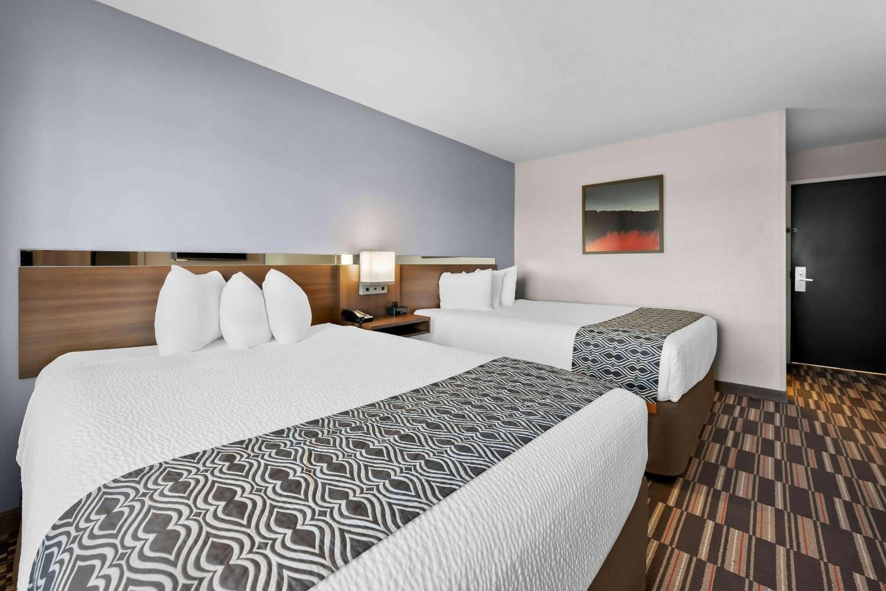 Bed in Microtel Inn & Suites by Wyndham Sweetwater
