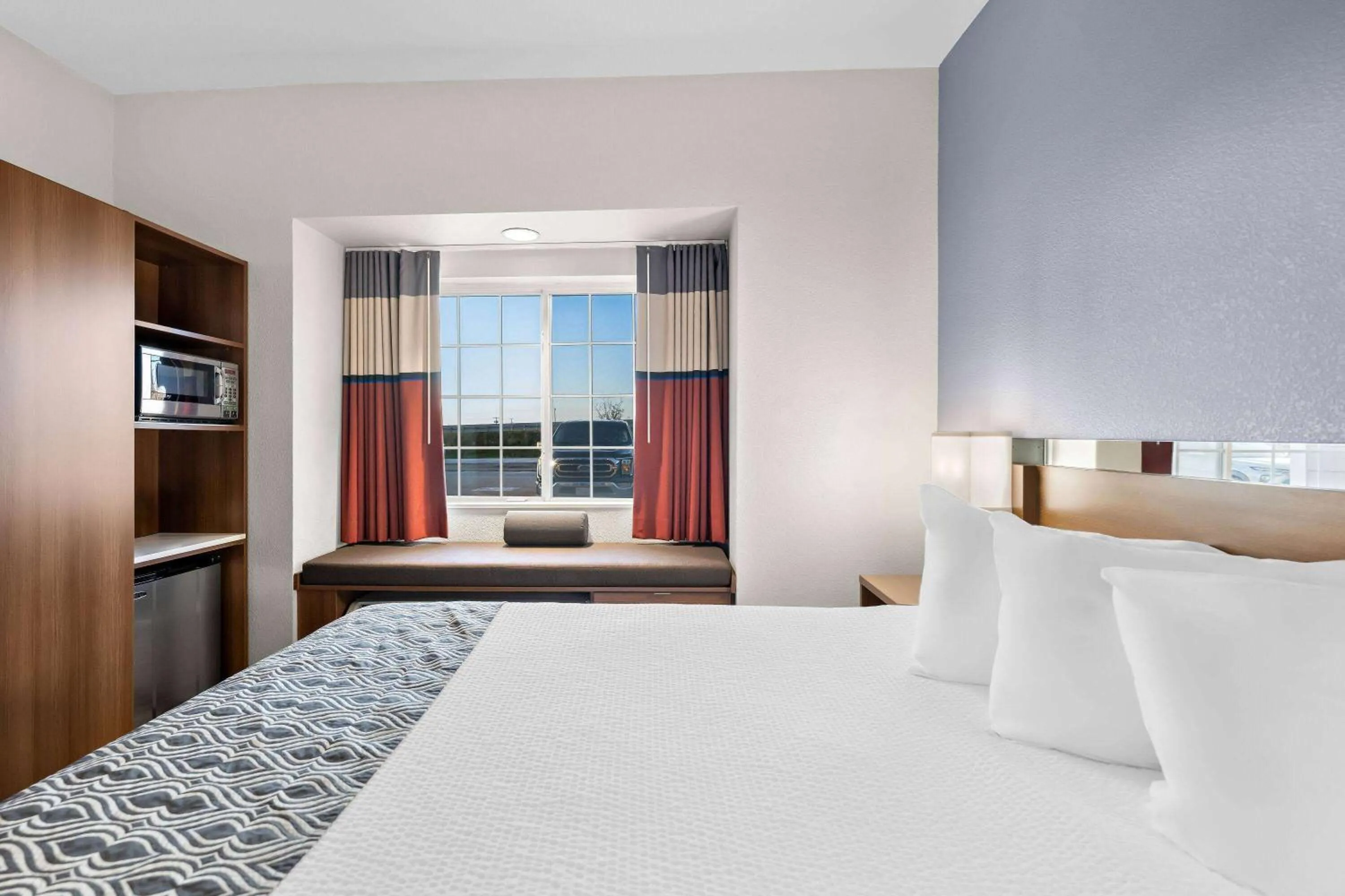 Bed in Microtel Inn & Suites by Wyndham Sweetwater