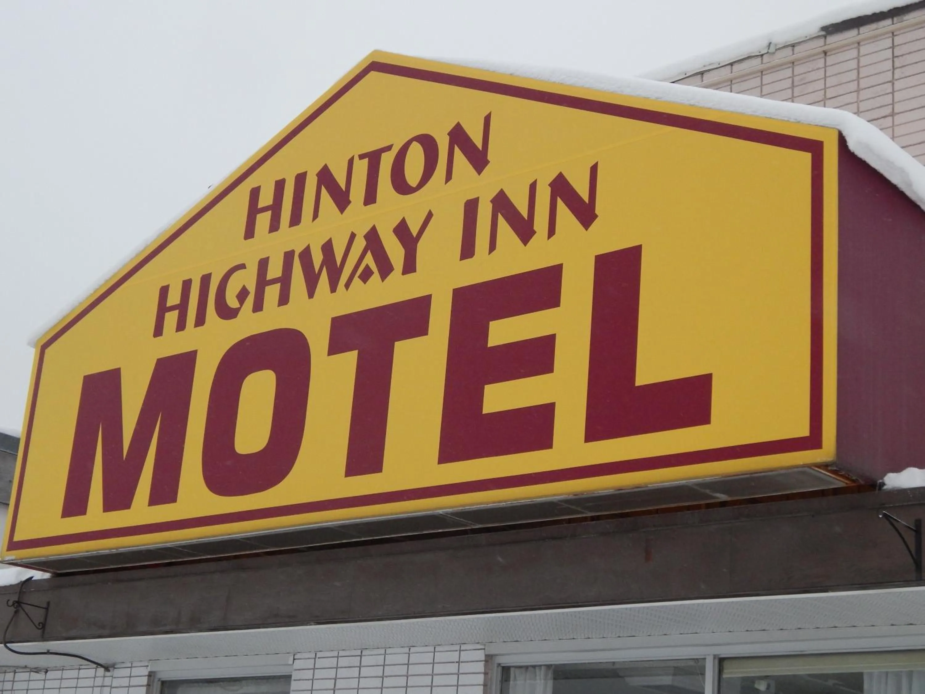 Property logo or sign in Hinton Highway Inn