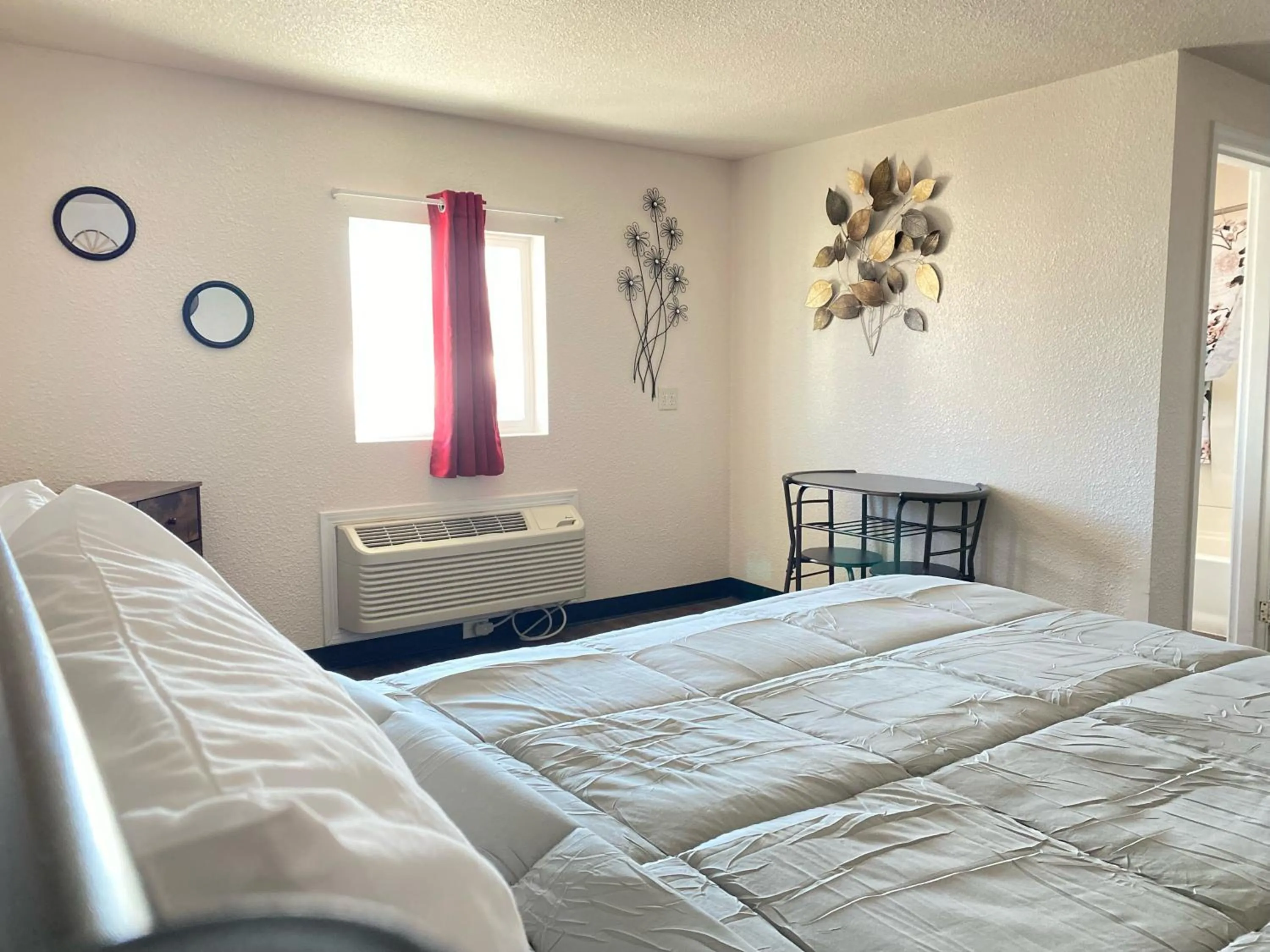 Bed in Baker City Motel & RV