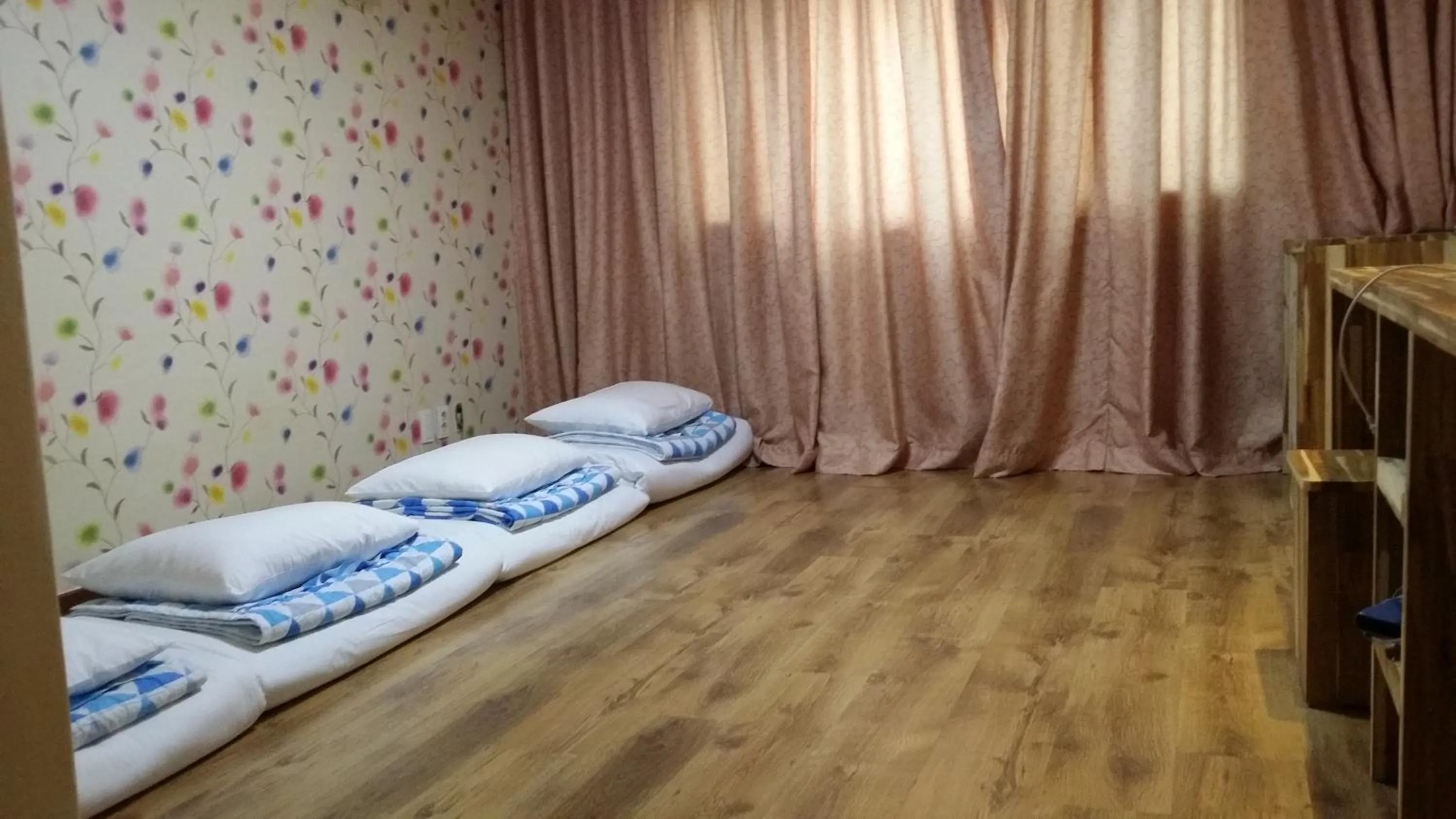 Bed in Green and Blue Hotel